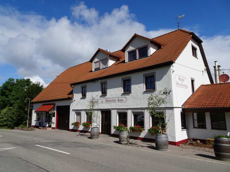 Jahrhundertstein Deutsches Haus Runde von Weilheim an