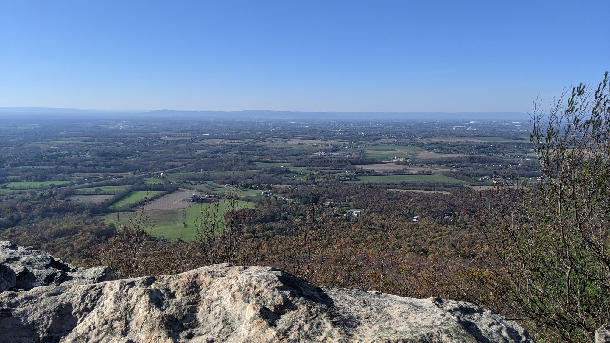 Sunny panoramic view of a wide valley with forests and fields. - Appalachian Trail to Annapolis Rock and Black Rock
