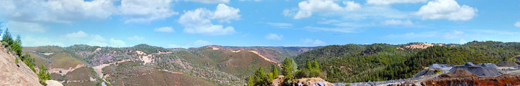 Panoramic view of a vast, sunlit, hilly landscape under a blue sky. - Western States, Robie Point, Cardiac Hill and Shirland Canal Loop