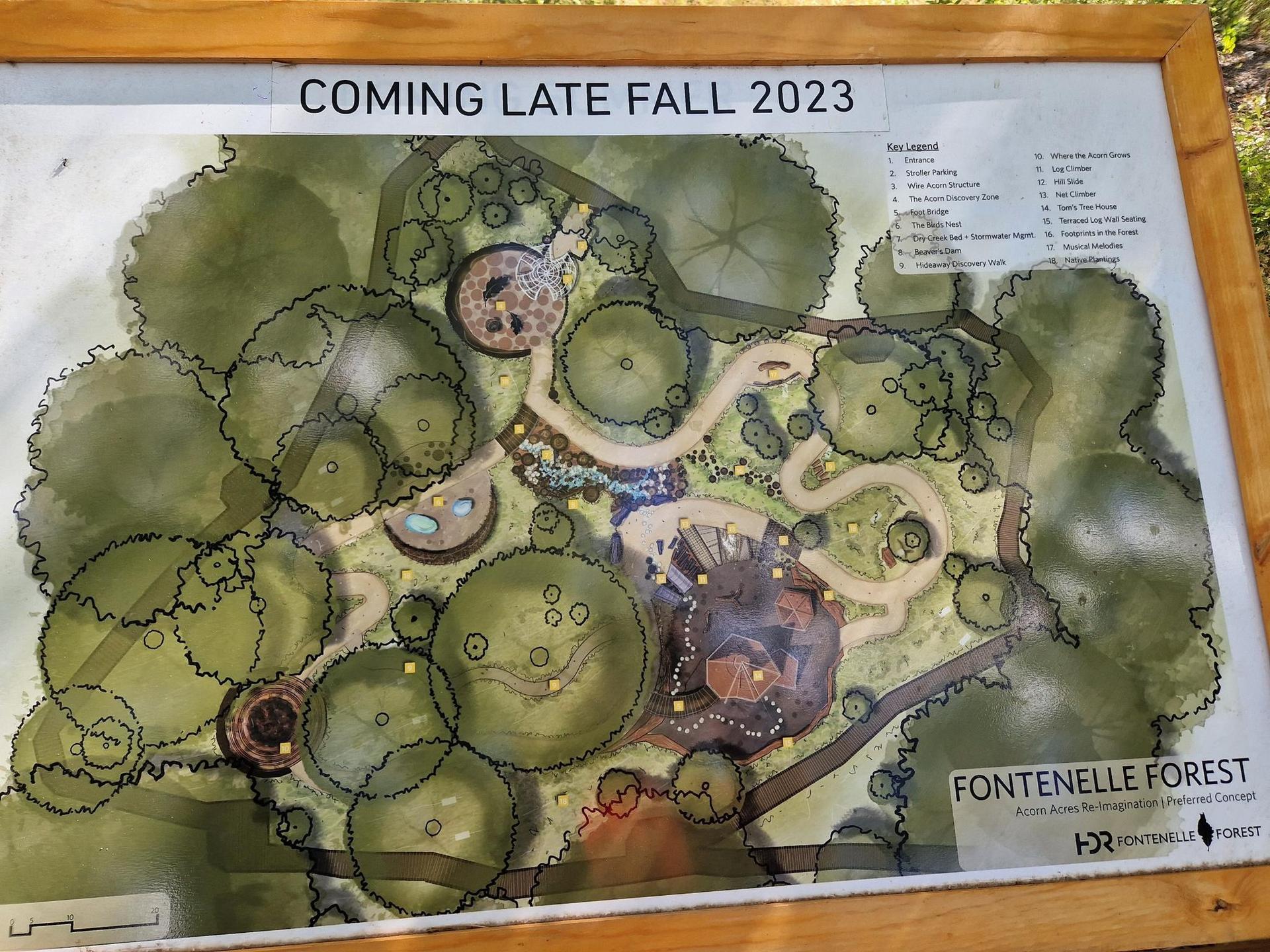 A detailed map shows an aerial view of a forest adventure park layout.