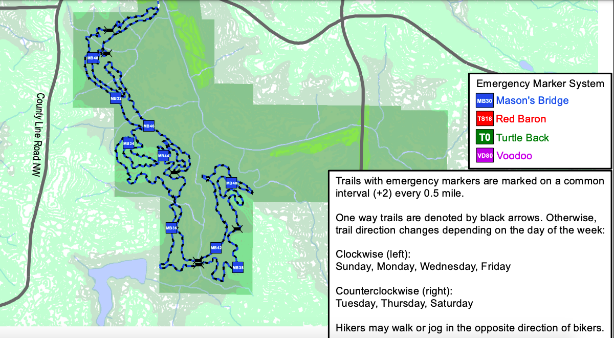 A colorful map displaying winding trails, green terrain, and emergency marker information.