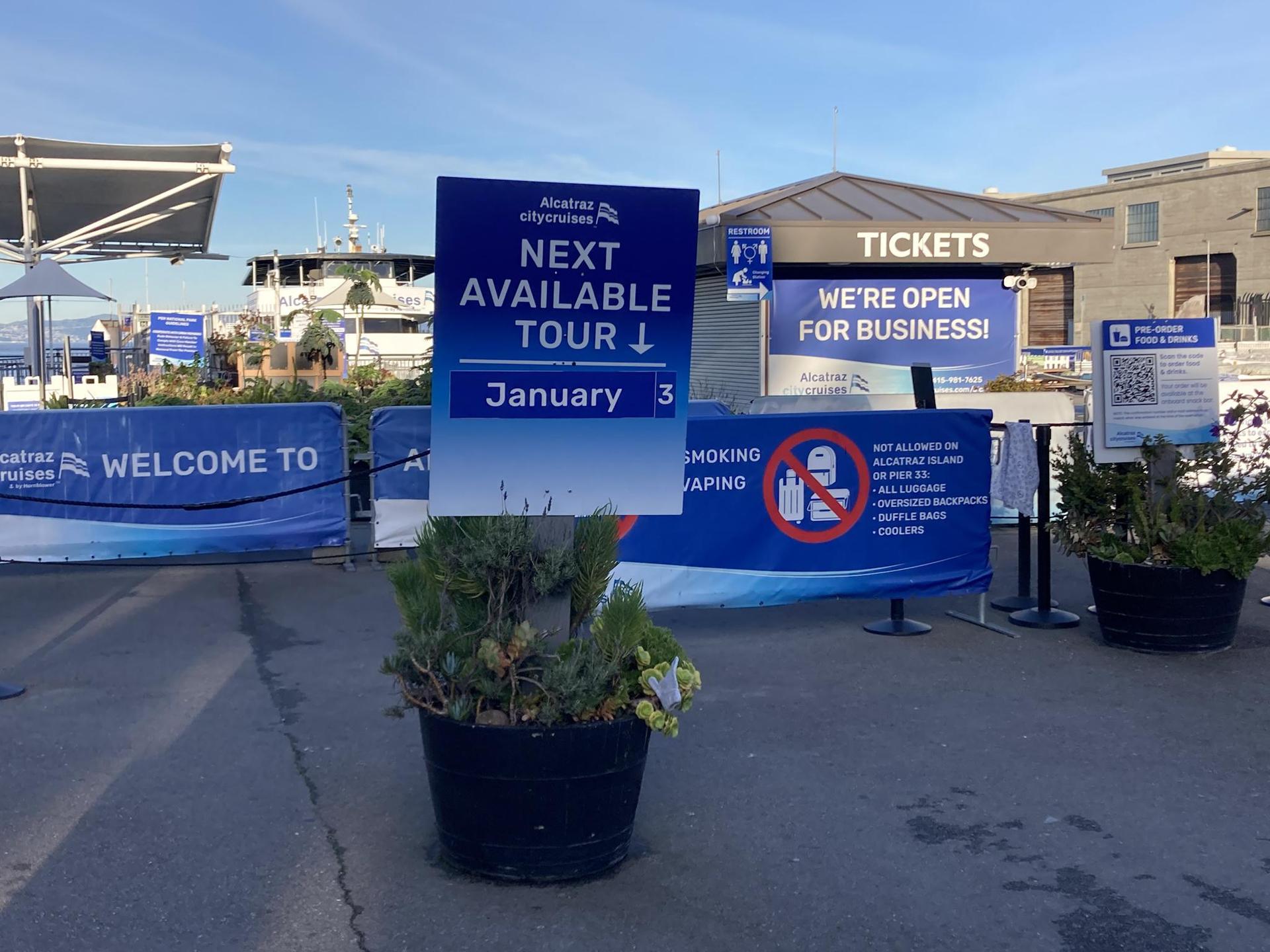 Information signs for tours, including 'Next Available Tour' and 'Tickets'.