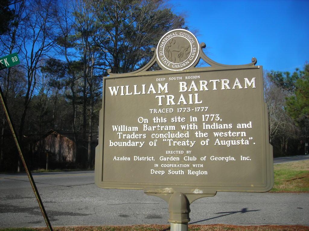 A historical marker sign for William Bartram Trail on a sunny day.