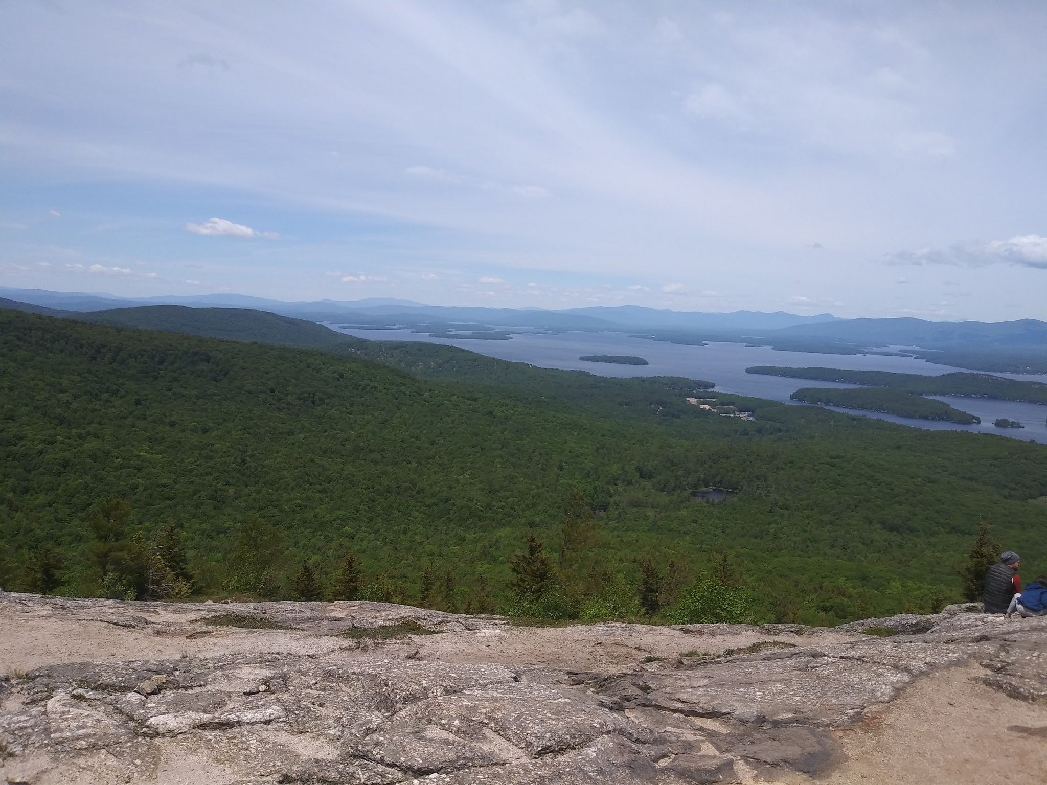 Panoramic view from a rocky peak, overlooking a vast forest and multiple lakes. - Mount Major via Jesus Valley - Beaver Pond Trail