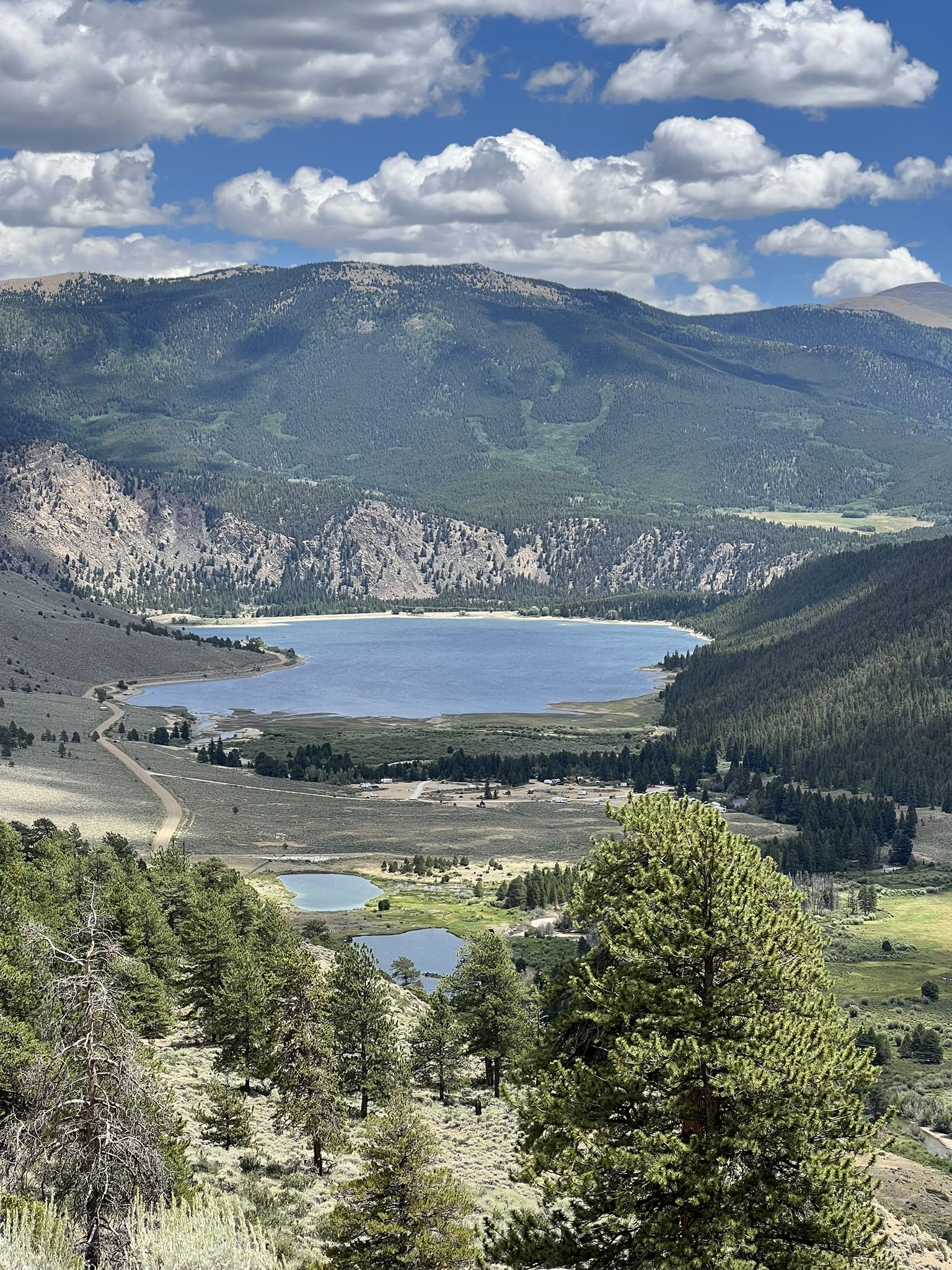 Aerial view of a large lake and smaller ponds nestled in a mountain valley. - Colorado Trail: Collegiate East - Segment 11