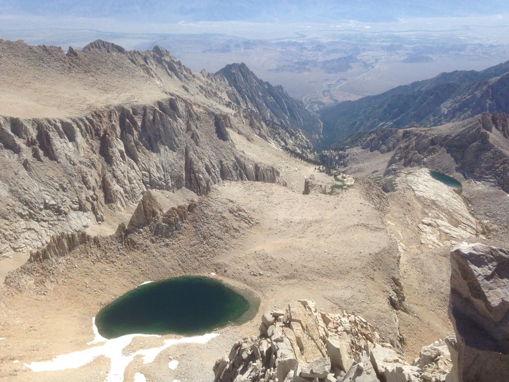 High-angle view of a vast, rocky mountain landscape with two small lakes. - Mount Whitney Mountaineer's Route