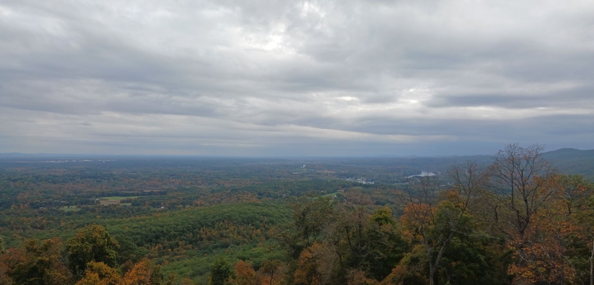 Wide landscape view of autumn trees under a cloudy sky. - Mount Holyoke Summit via NET/M&M Trail