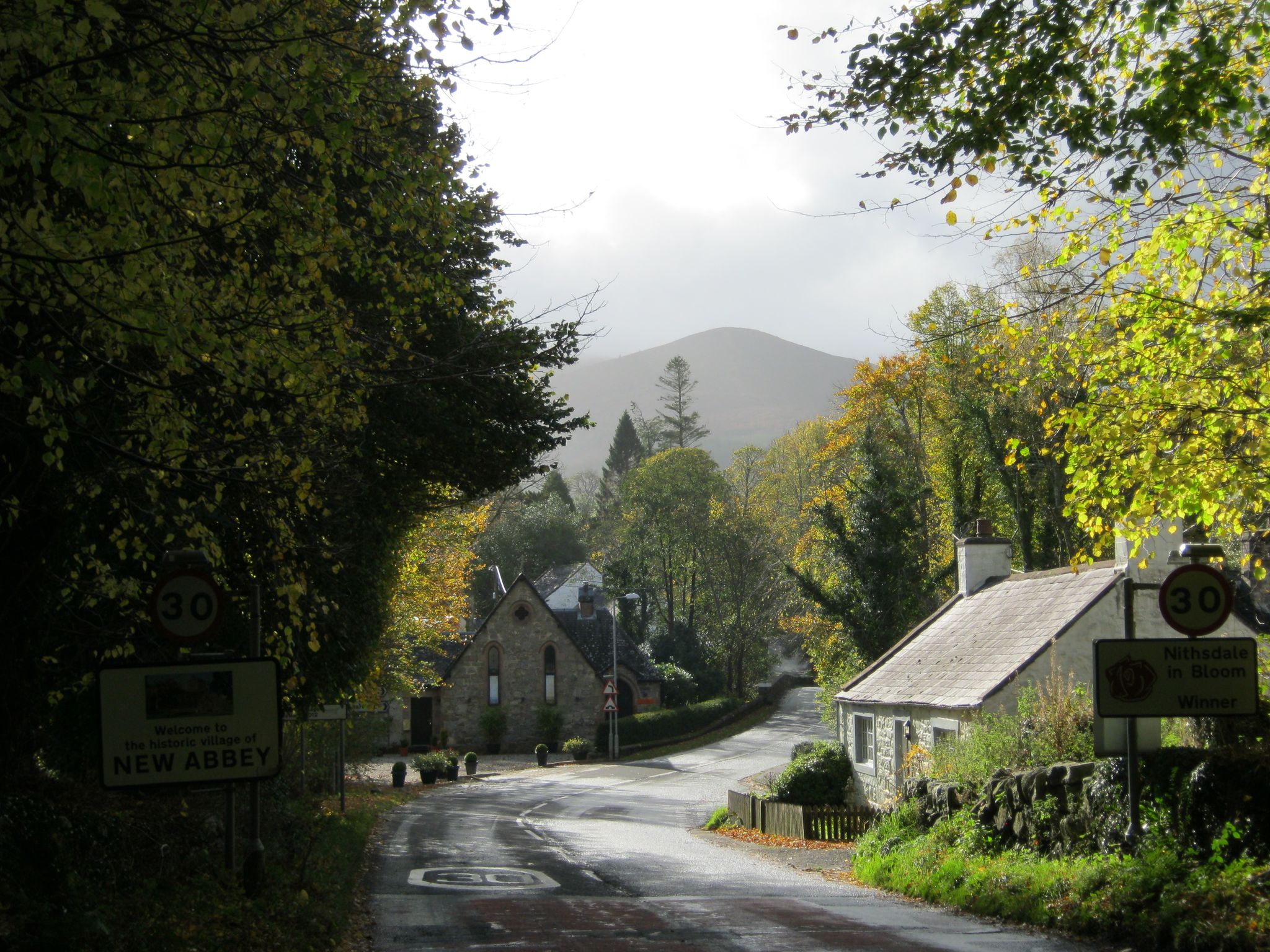 Entering New Abbey with Criffel towering in the background.
