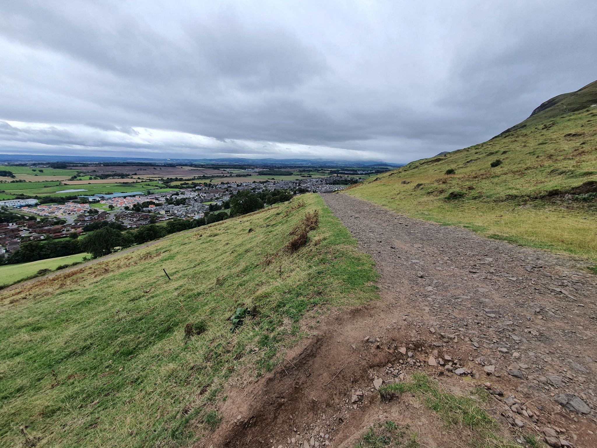 Take the farm track down the hill.