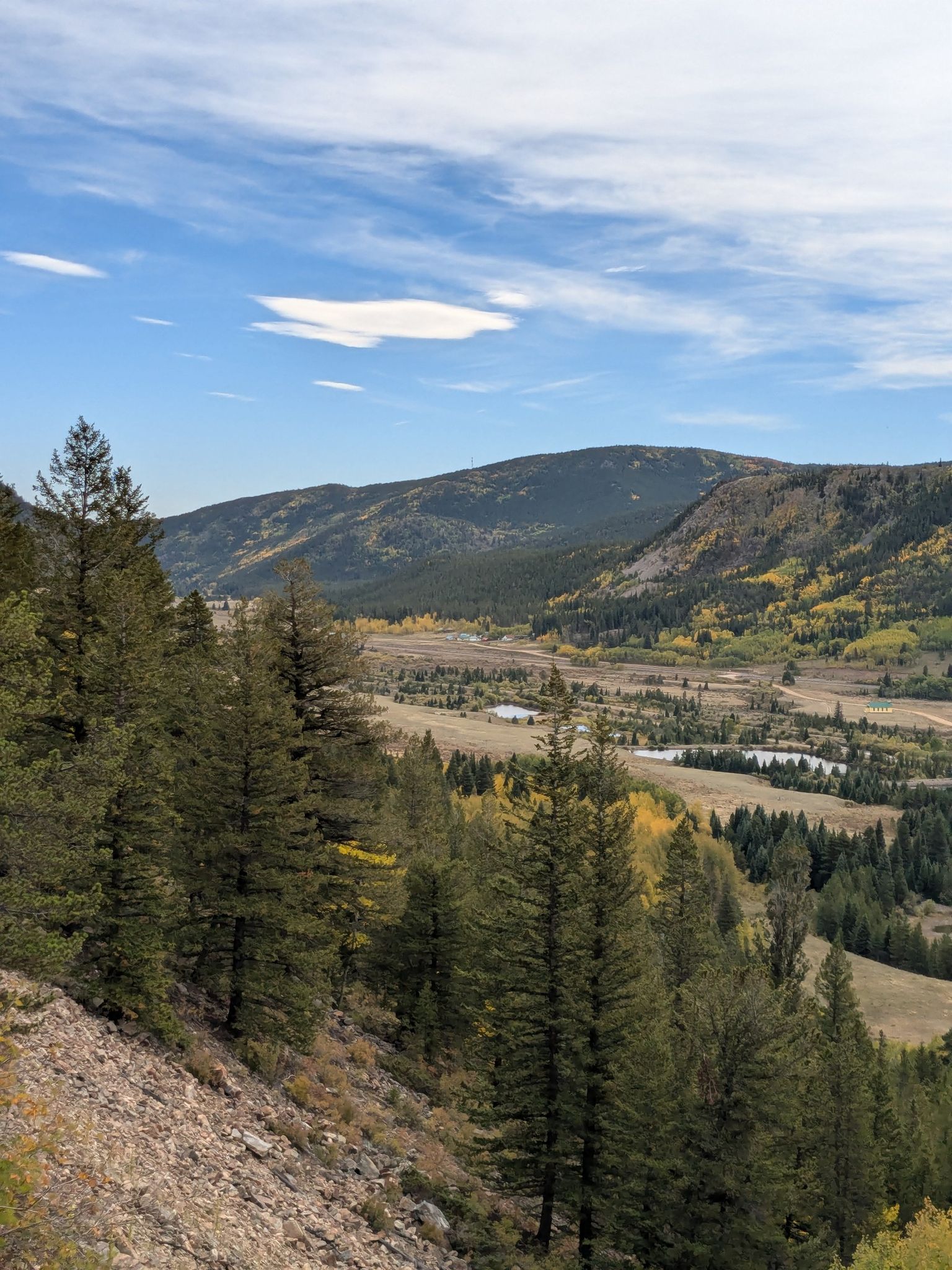 Scenic valley view with pine trees, colorful autumn foliage, and mountains. - Yankee Doodle Lake loop from CPDS050 West Portal Mp 50.1