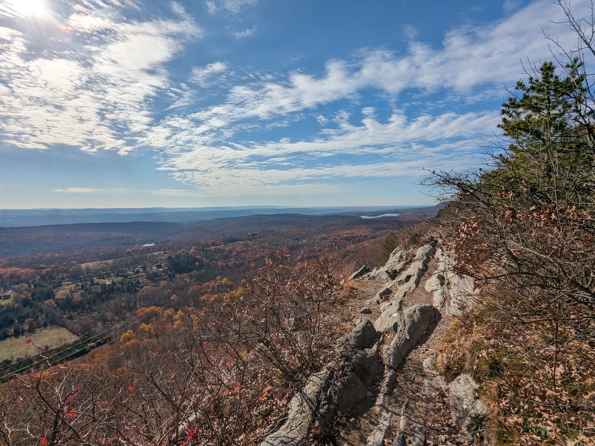 Sunny panoramic view from a rocky cliff over a vast autumn forest valley. - Coppermine, Rattlesnake Swamp, Appalachian, and Kaiser Trail Loop