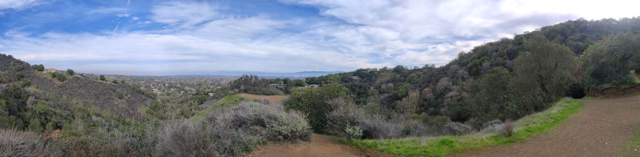 Panoramic view of green and brown hills under a partly cloudy sky. - Adobe Creek – Mary Davey Memorial loop from Foothill College