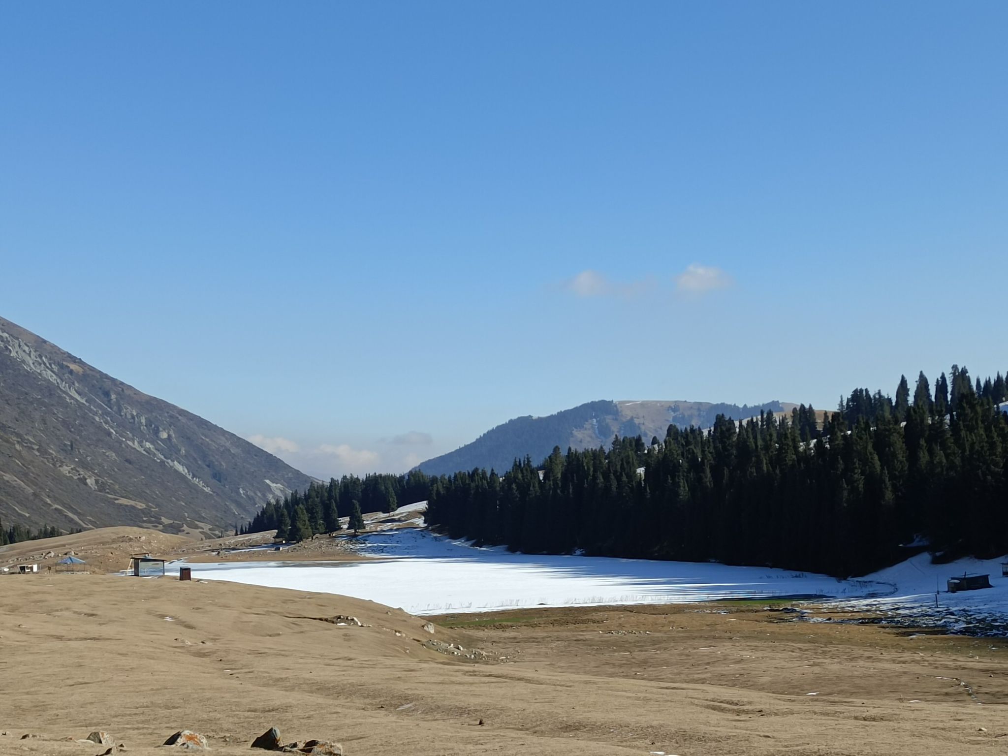 snow covered mountain lake