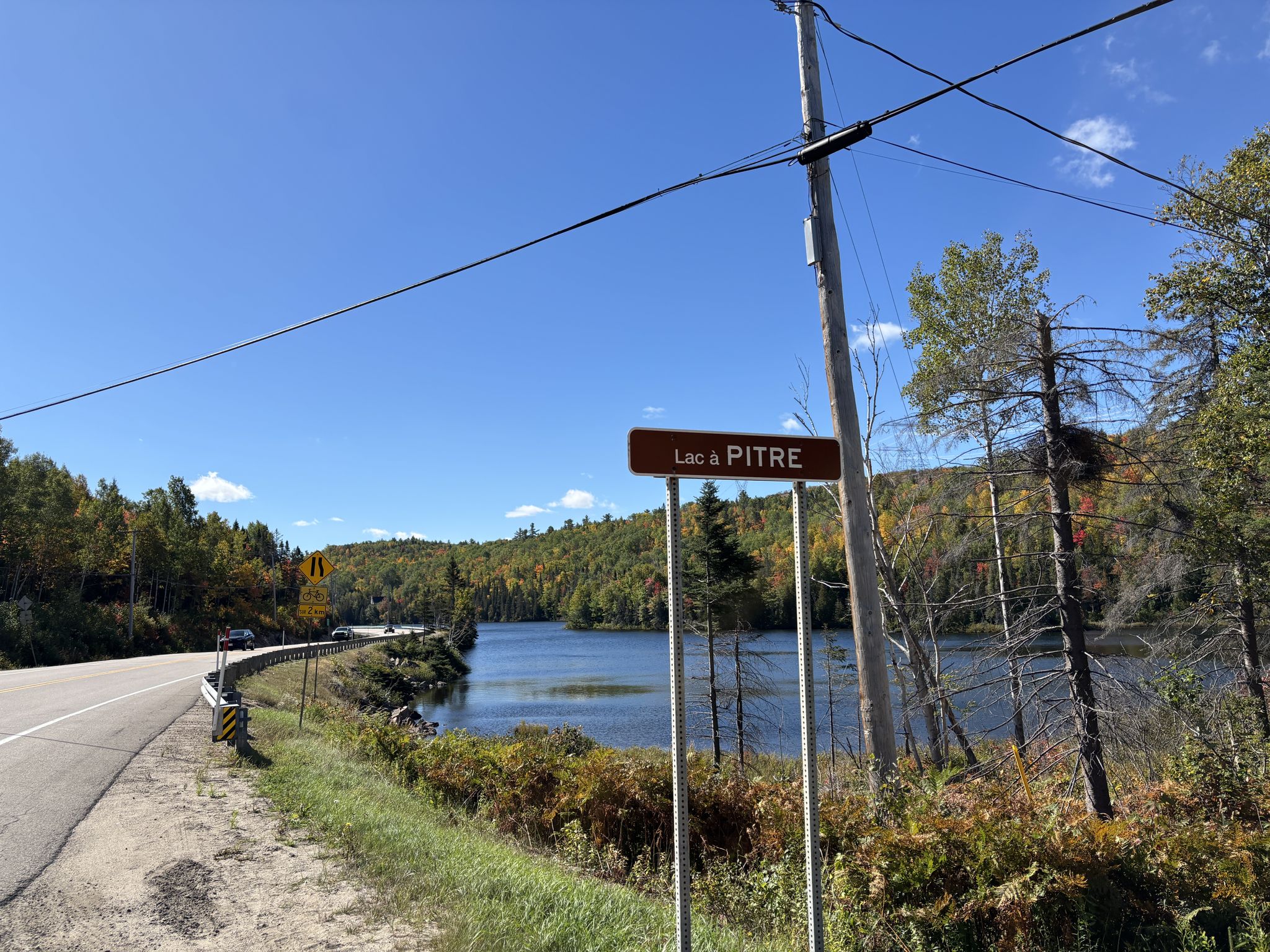 Endless lakes along the route, with fall colours starting.