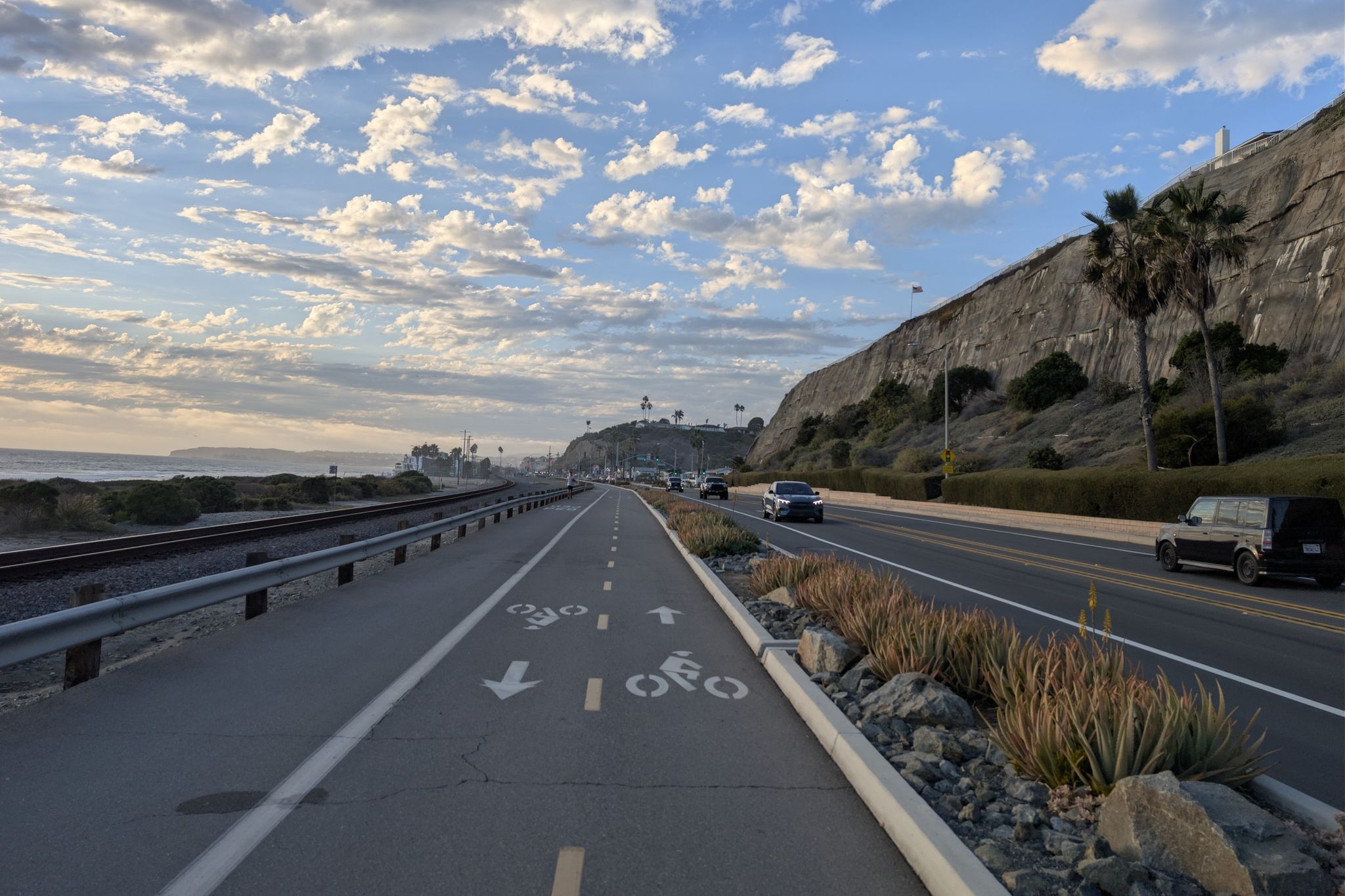Golden hour light on a coastal road, bike path, and railroad tracks. - San Juan Creek Trail and Coastal Loop
