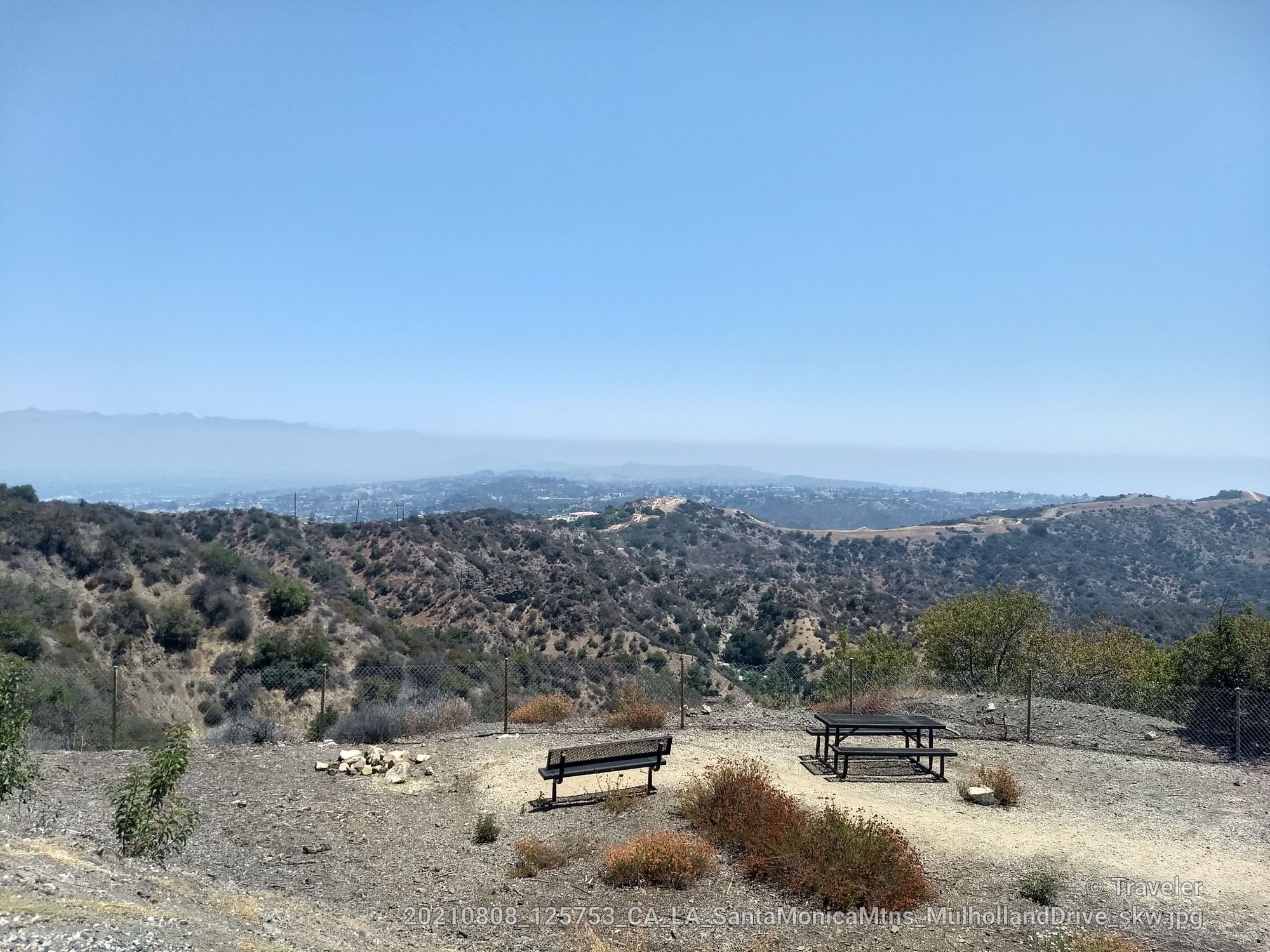 Overlook with benches and picnic table on a dry, hazy, sunny day. - Encino Reservoir & San Vicente Mountain Gravel loop from Calabasas