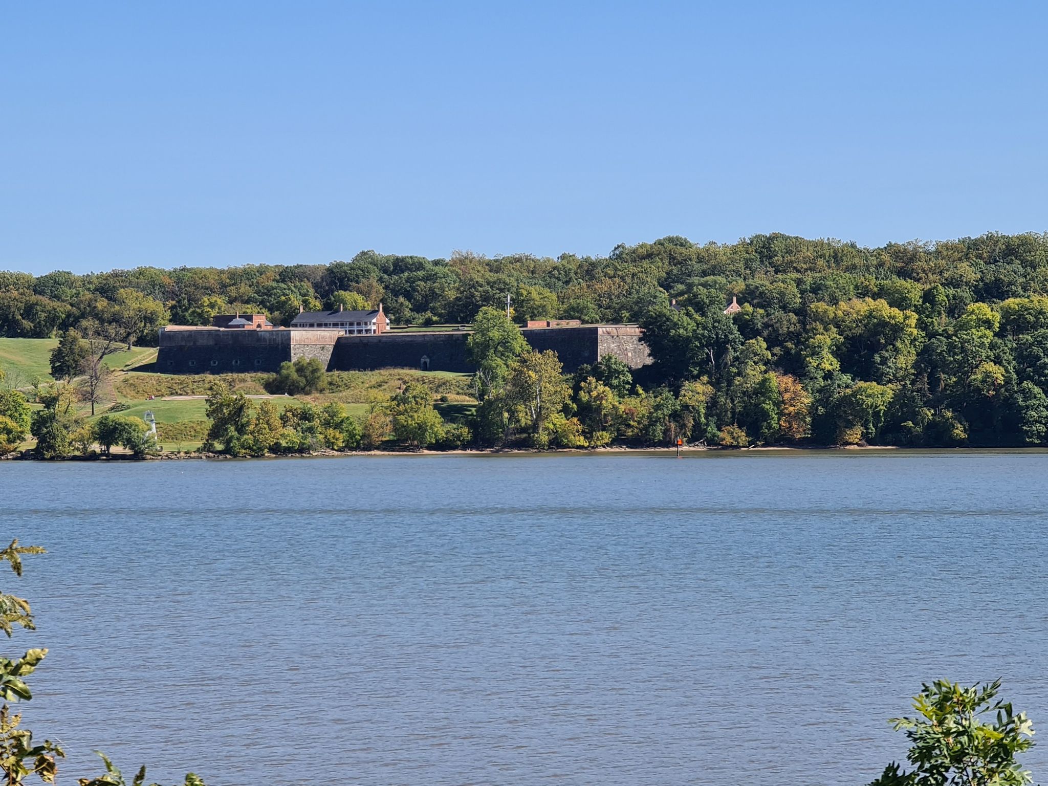 Large stone fort on a green hill overlooking a wide river. - Mount Vernon Trail