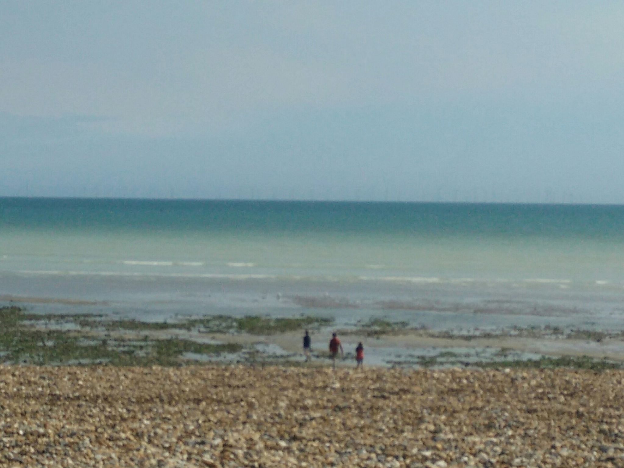 Looking from the promenade out to sea at low tide