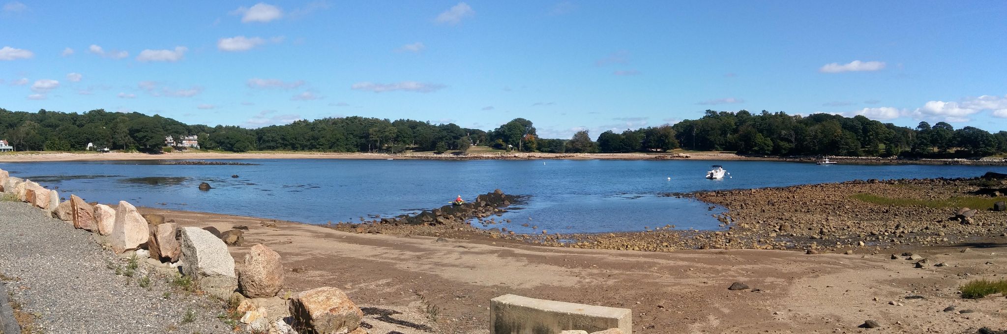 Panoramic view of a calm bay with exposed mudflats and distant trees. - White, Black & Grey beach loop from Salem