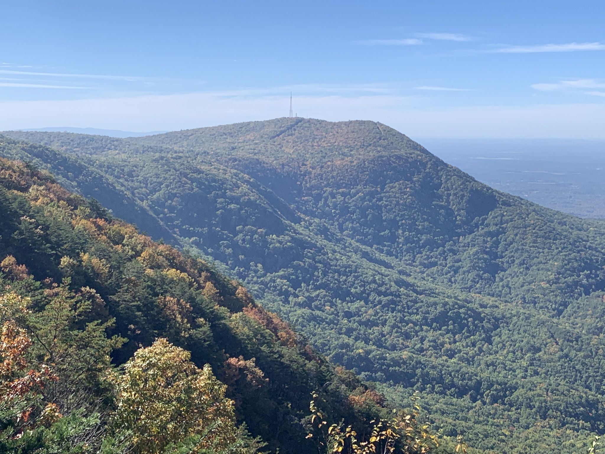Forested mountain range under a clear blue sky on a bright day. - Fort Mountain - Fire Tower – Fort Mountain West Overlook loop from Fort Mountain State Park