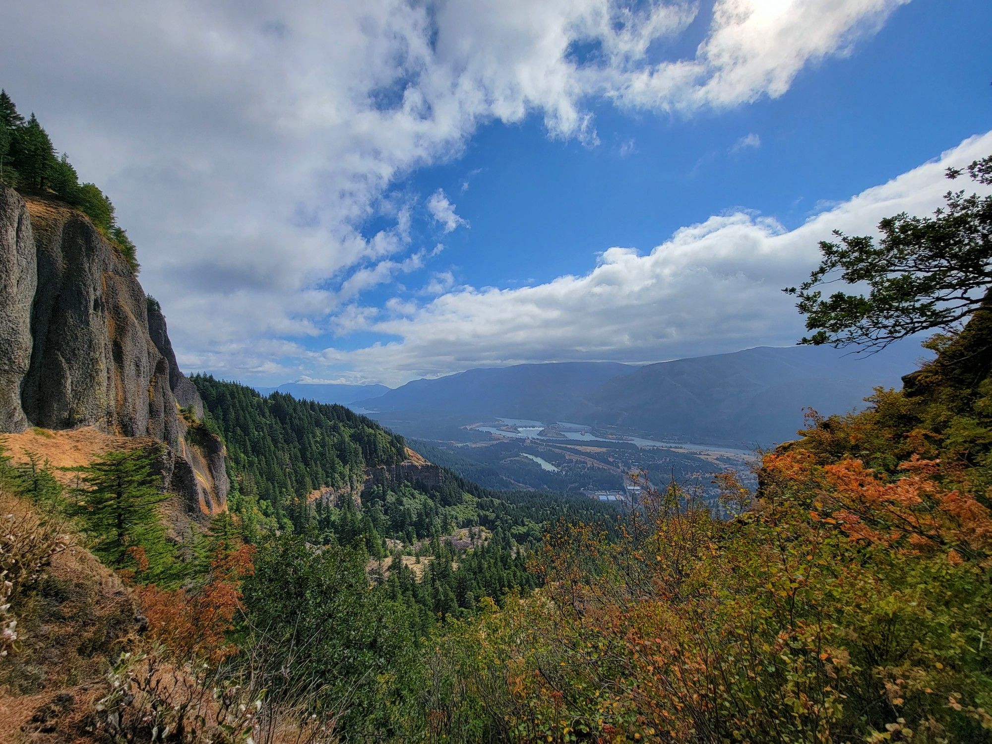 River valley, mountains, and forests under a partly cloudy sky. - Hamilton Mountain and Hardy Ridge Loop