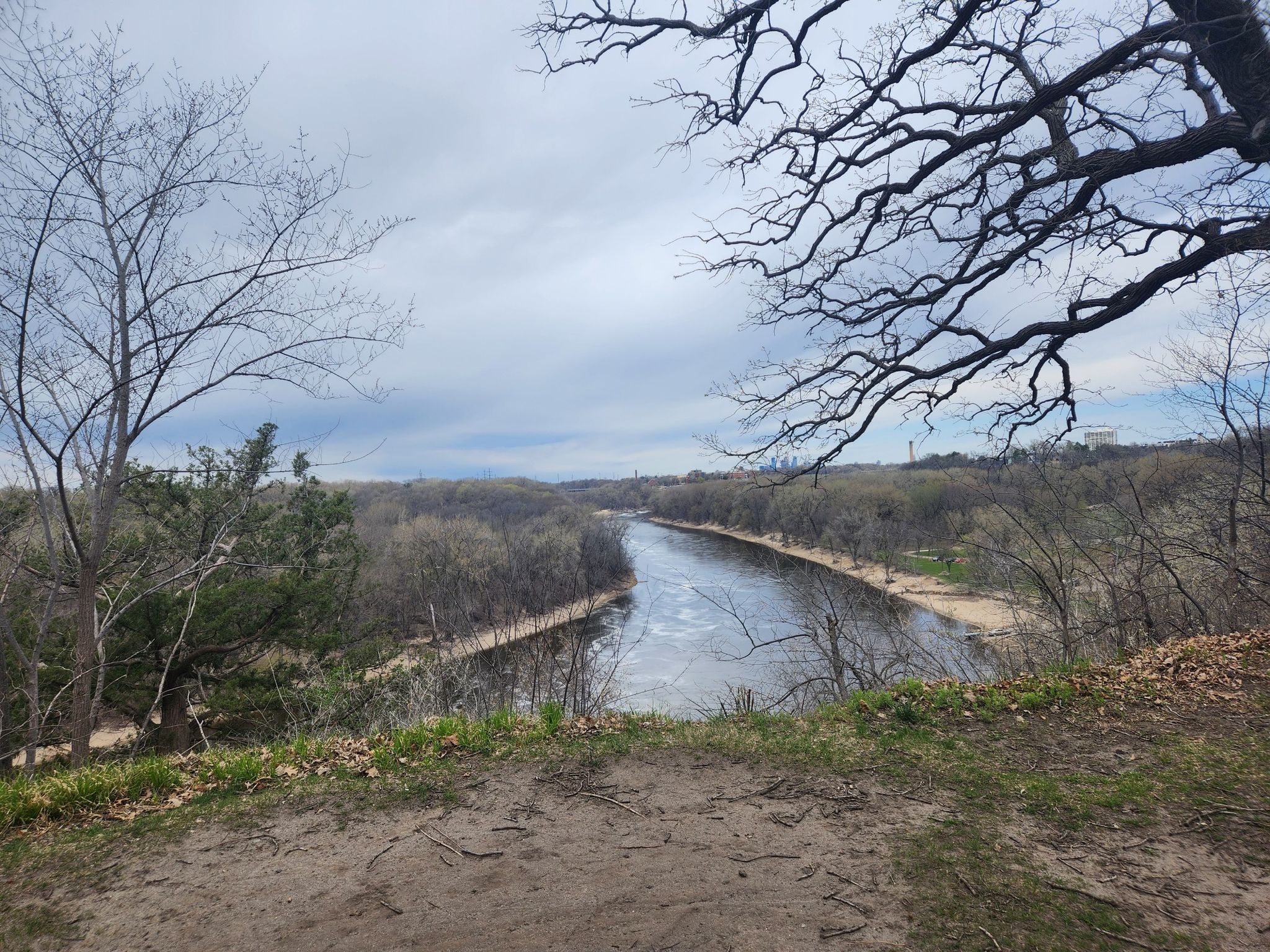 River winding through bare winter trees, viewed from a high vantage point. - Saint Paul Grand Round