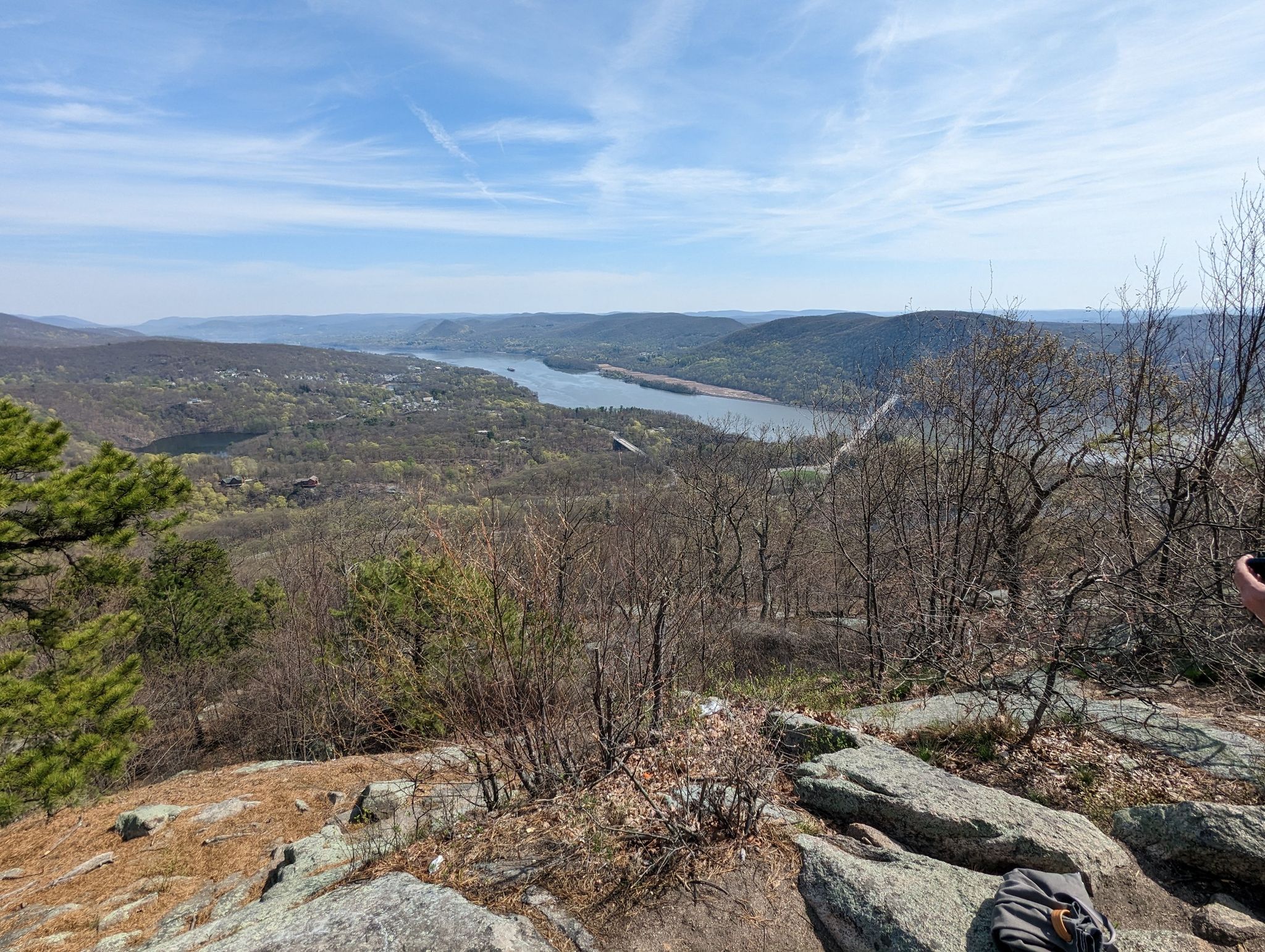 Panoramic view of a wide river winding through a forested valley under a clear sky. - Bear Mountain Loop via Major Welch and Appalachian Trail