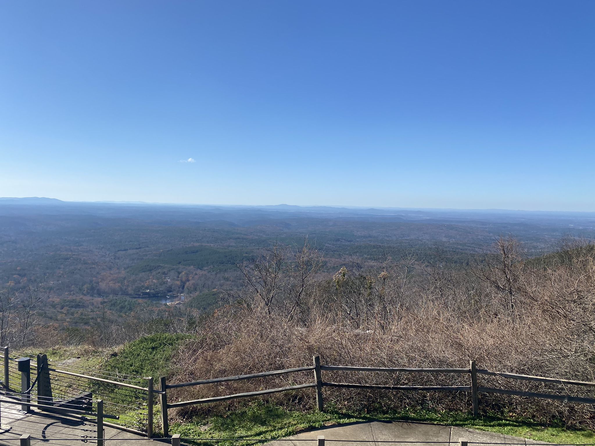 Expansive view of a vast forested landscape under a clear blue sky. - Cheaha Express, Bunker Loop and Deer Run
