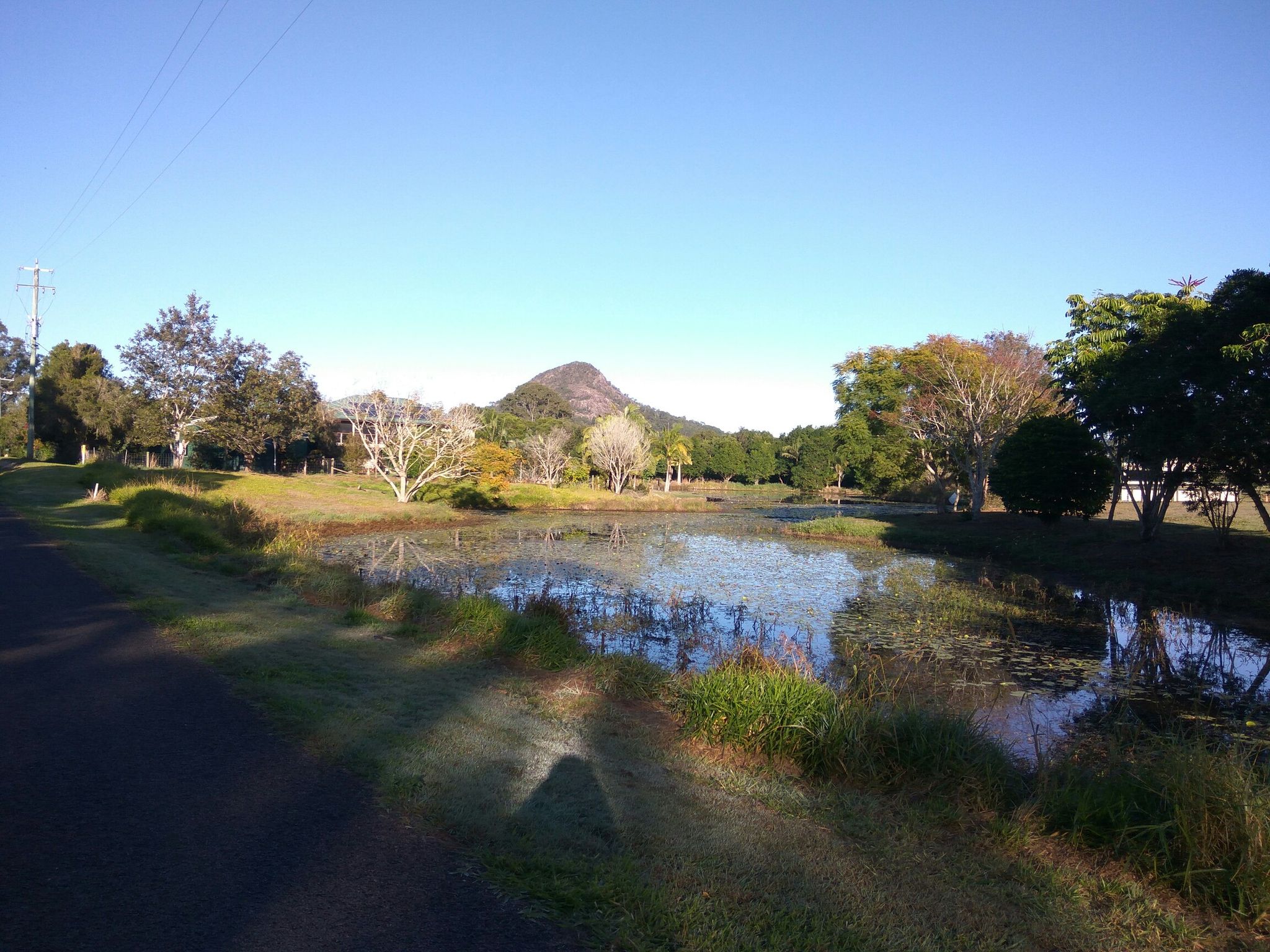 passing by the 6 miles Creek with Mt. Cooran in the background