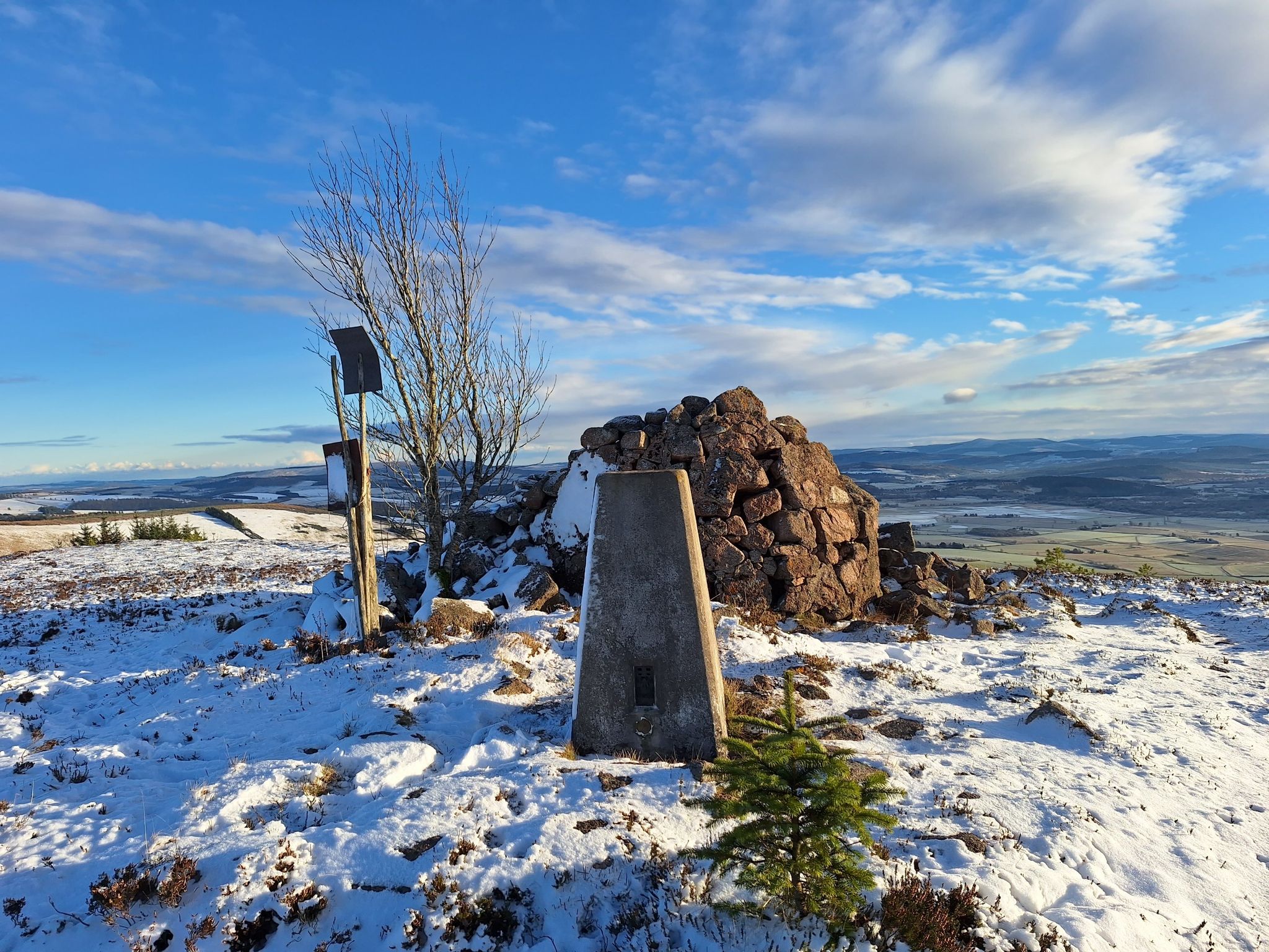 Summit trig point and wildfire beaters