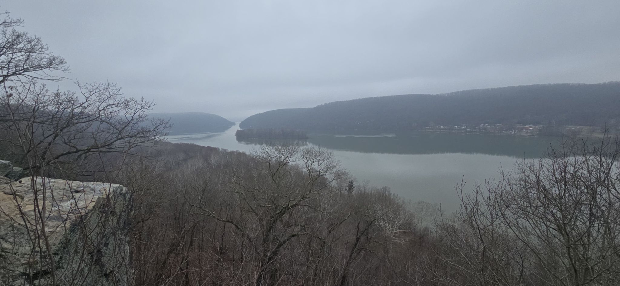 Overcast view of a wide river winding through forested hills. - Pinnacle Overlook from Pequea via Conestoga Trail