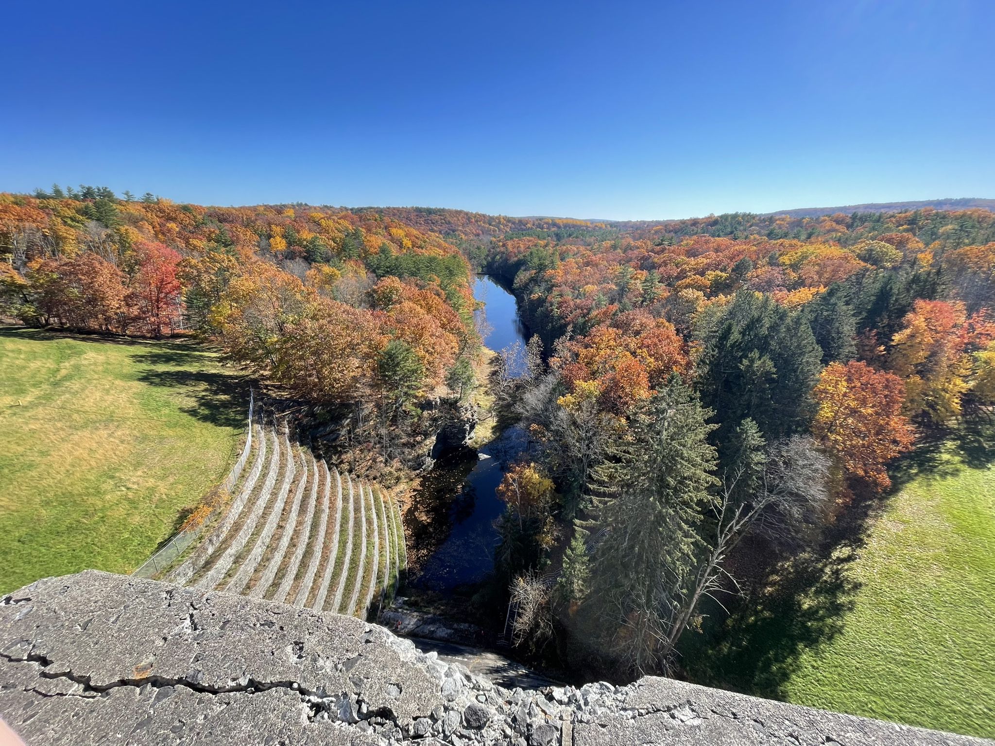 River winding through a valley of vibrant autumn trees, seen from above. - Upper Ashokan Reservoir – Ashokan Reservoir loop from Boiceville