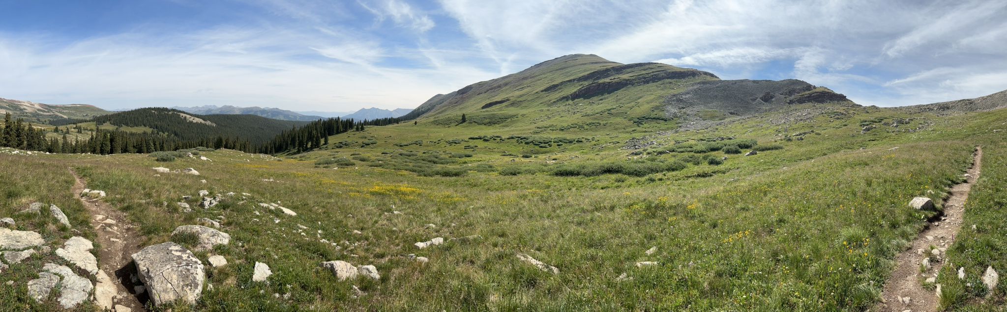 Panoramic view of a vast green mountain landscape under a bright sky. - Colorado Trail: Copper Mountain to Searle Pass