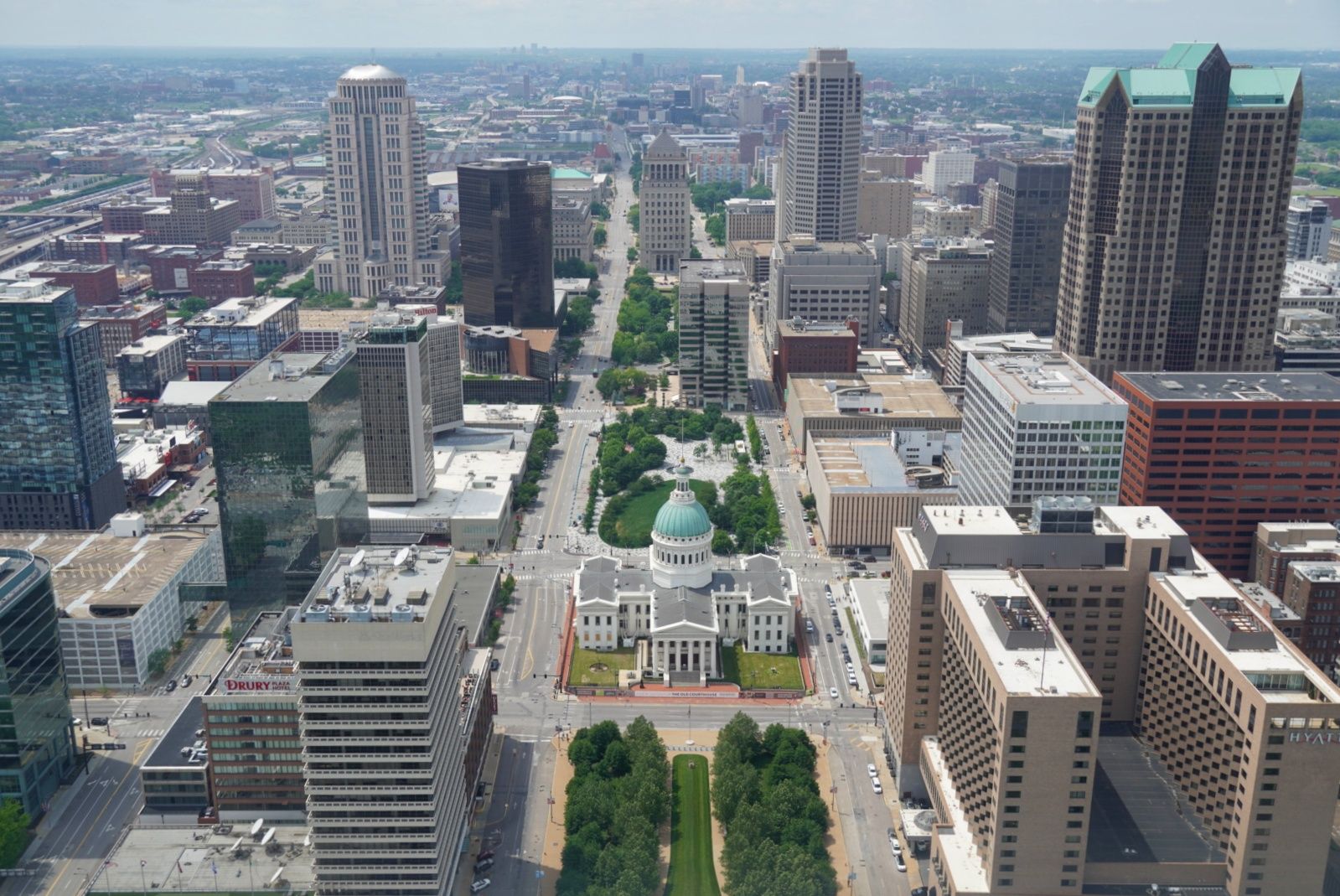 Aerial view of a bustling city with a prominent domed building. - MCT Schoolhouse Trail
