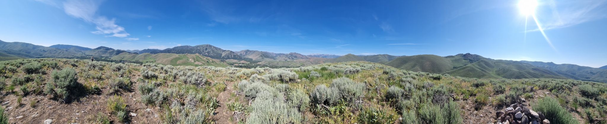 Panoramic view of brush-covered hills under a bright, sunny sky. - Prospect Hill Loop