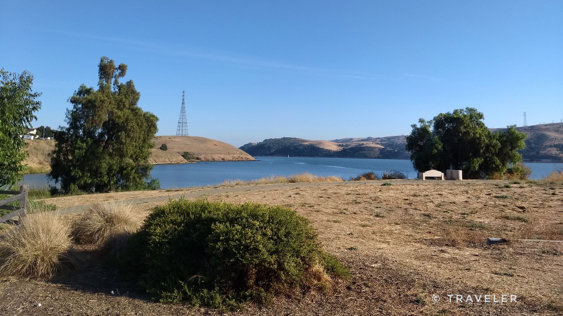 Expansive view of a calm bay surrounded by dry hills under clear skies. - San Francisco Bay Trail: Glen Cove to Marina