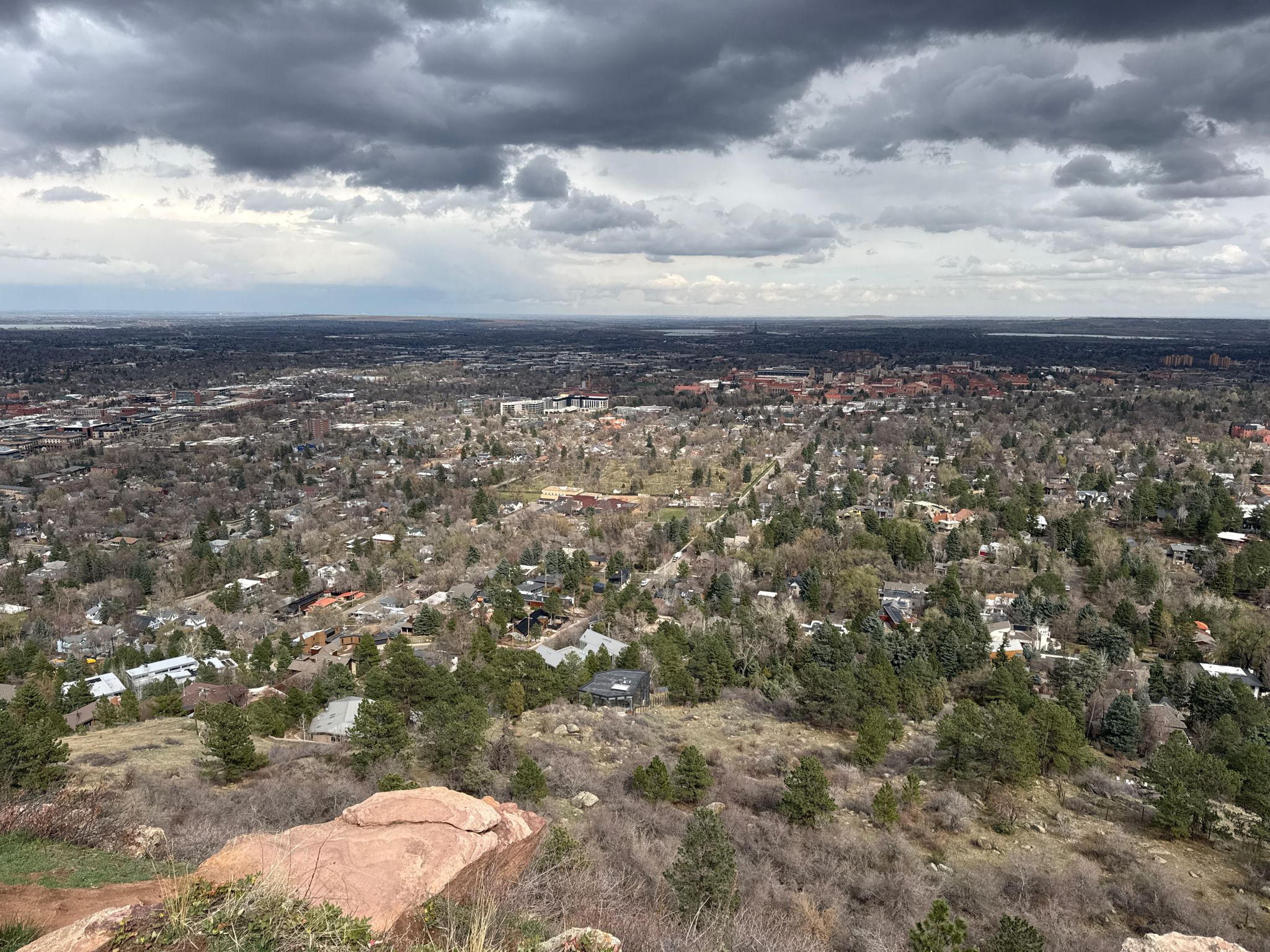Overcast sky above a sprawling town with many trees and buildings. - Chautauqua Trailhead – Flagstaff Road Scenic Drive loop from University of Colorado Boulder (Main Campus)