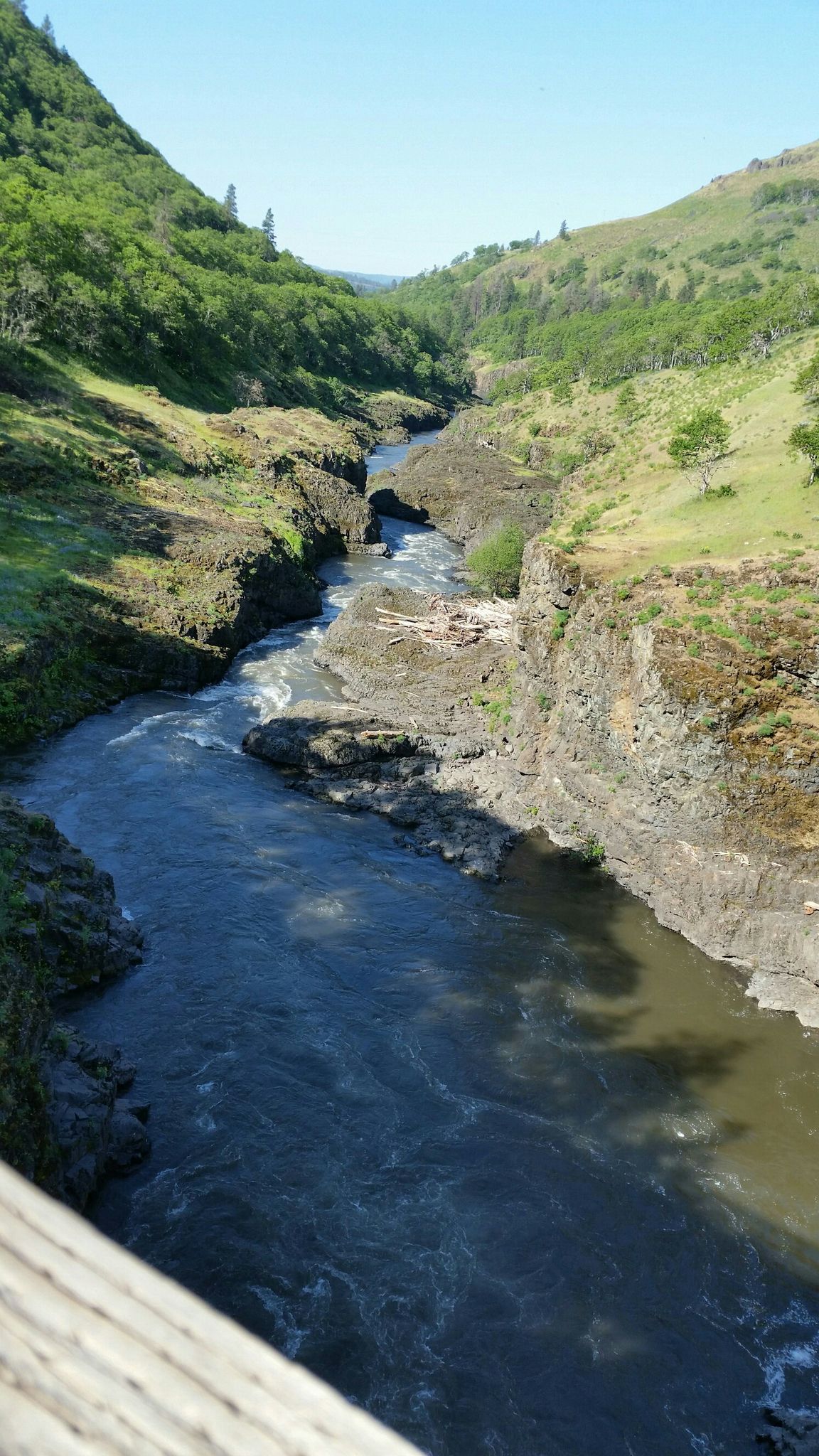 River winding through a deep, rocky canyon on a sunny day. - View of the Klickitat Valley – Klickitat Park loop from Mayer State Park