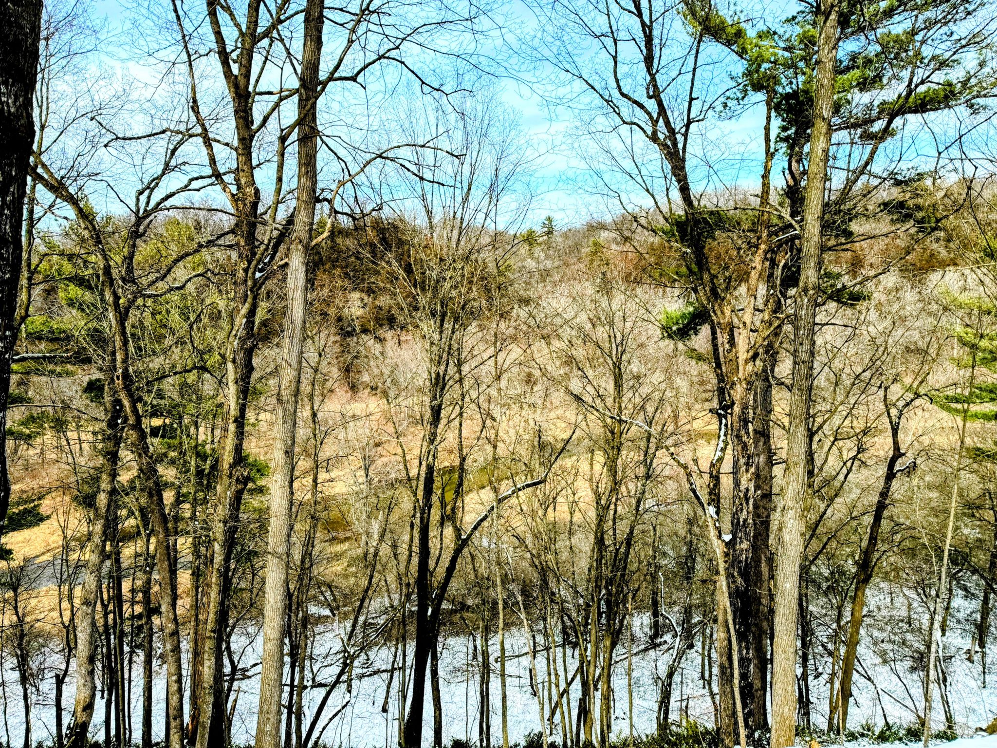 Kinnickinnick River Valley with limestone bluffs on the opposite side