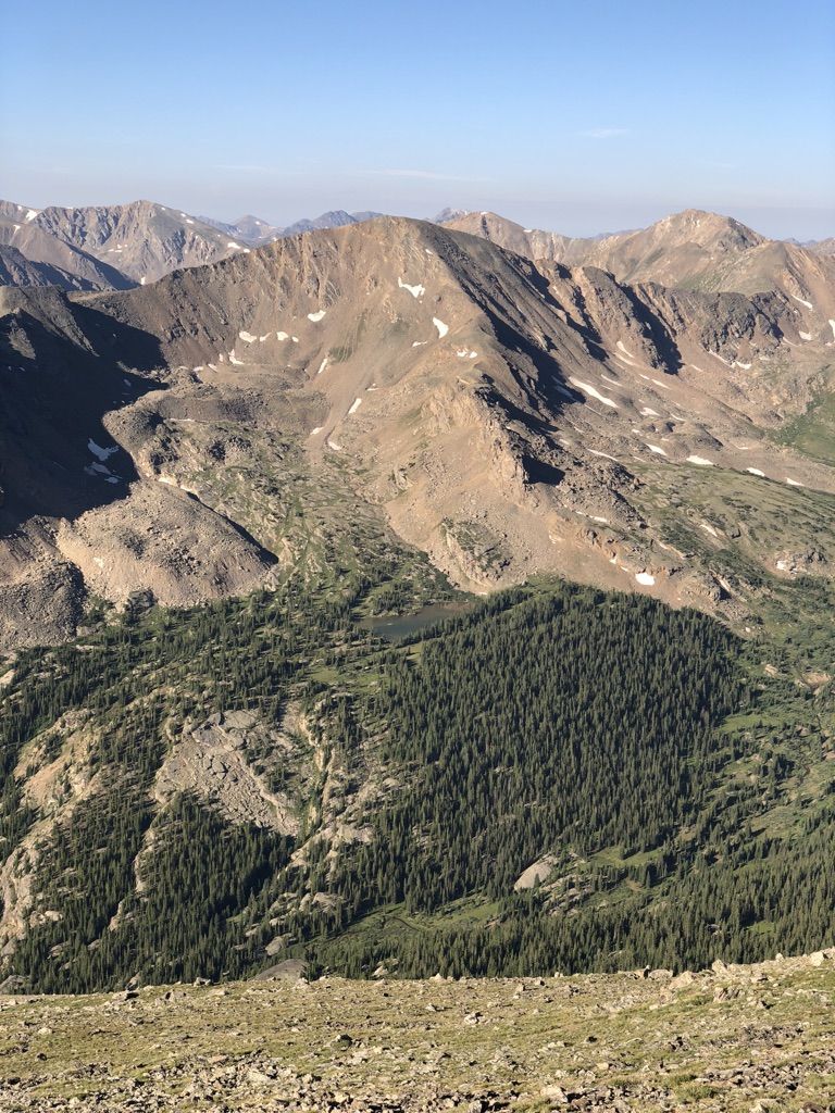 Vast mountain range with rocky peaks, forested valleys, and clear daylight. - Mount Massive Southwest Slopes Trail