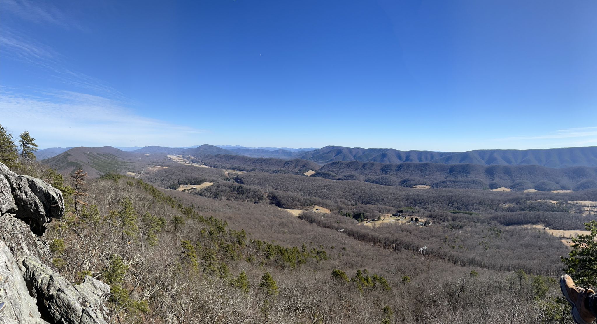 Expansive panoramic view of distant mountains and valleys under a clear blue sky. - Dragon's Tooth From Miller Cove Road