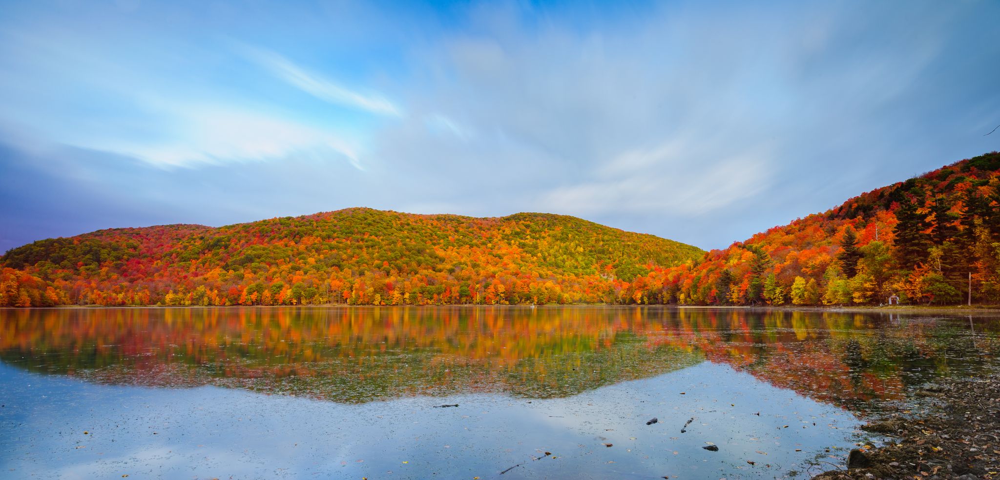The sky is clearing and the sunlight adds a nice golden sheen to the fall colour.