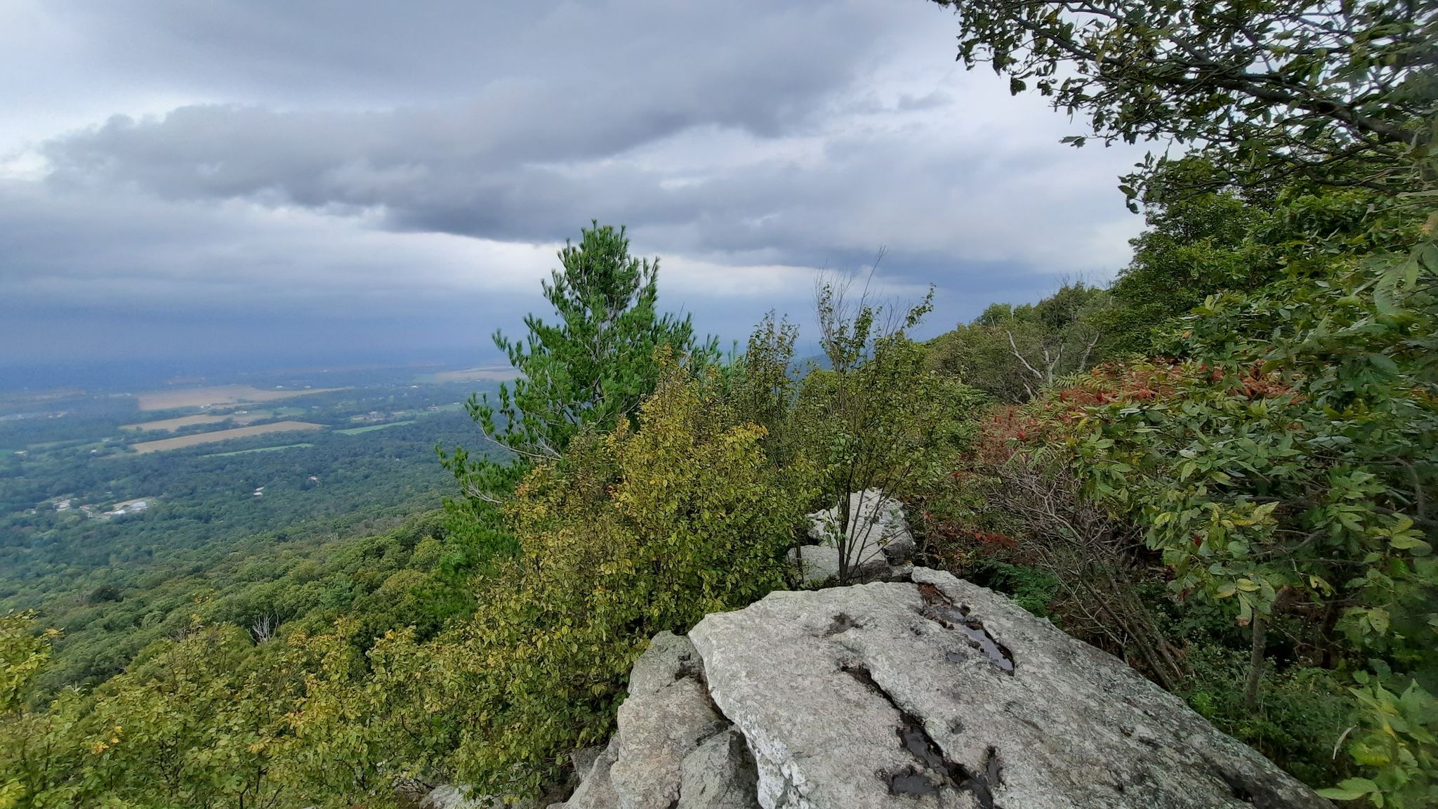 Rocky mountain overlook with a vast green valley under a cloudy sky. - Appalachian Trail to Annapolis Rock and Black Rock