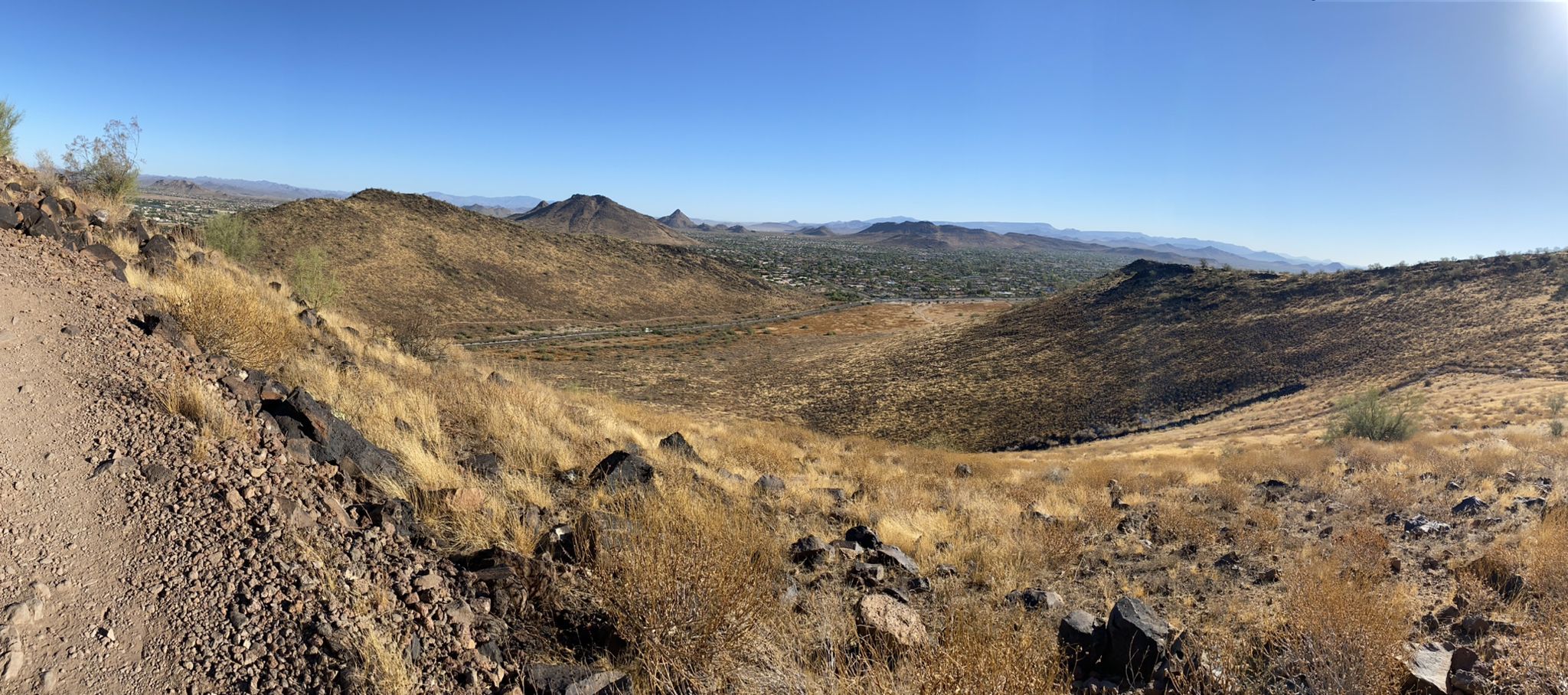Panoramic view of arid hills and valleys under a clear blue sky. - H-2 Trail and H-1 Trail Loop