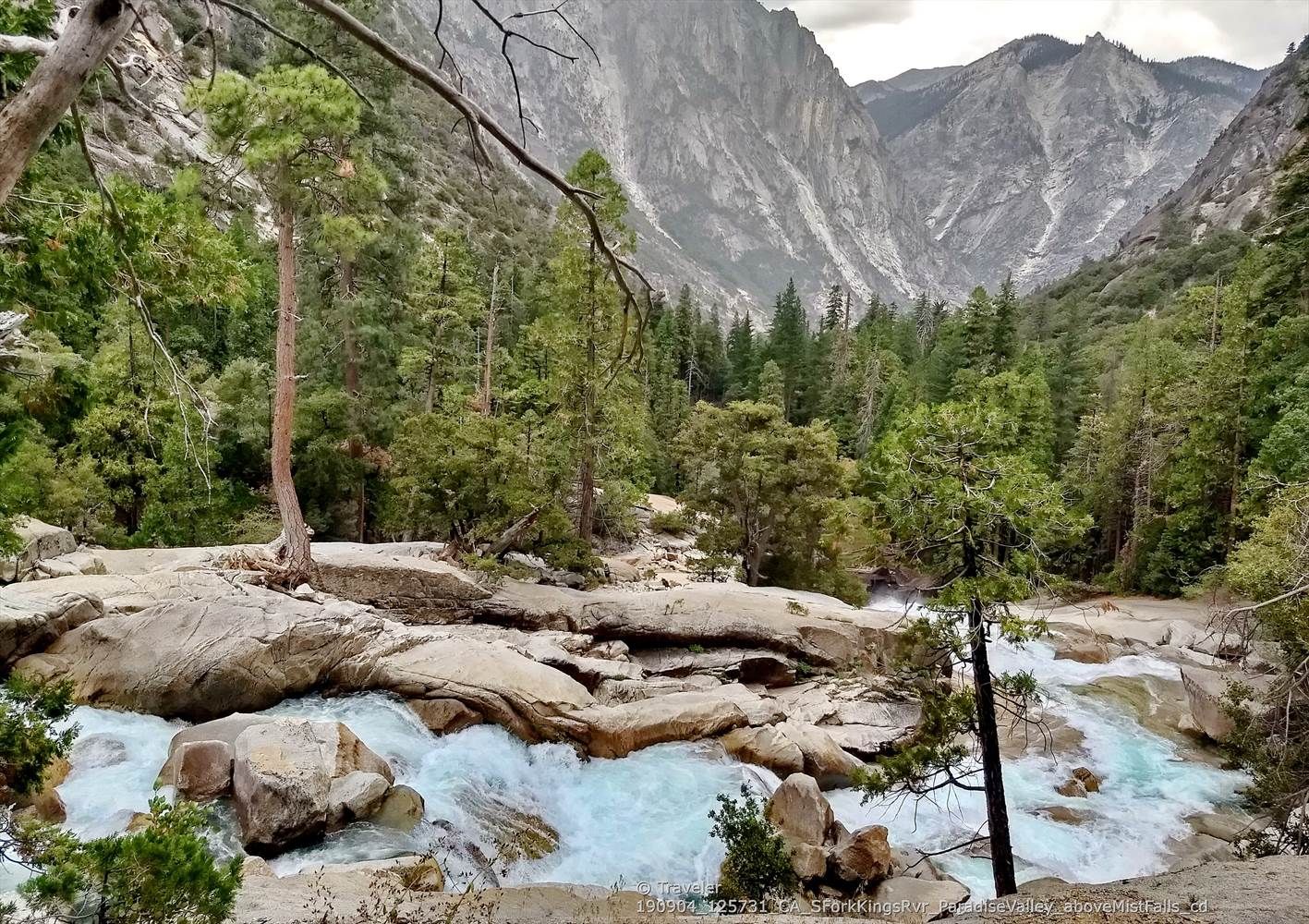 Rushing river through a rocky, forested canyon under cloudy skies. - Paradise Valley Trail