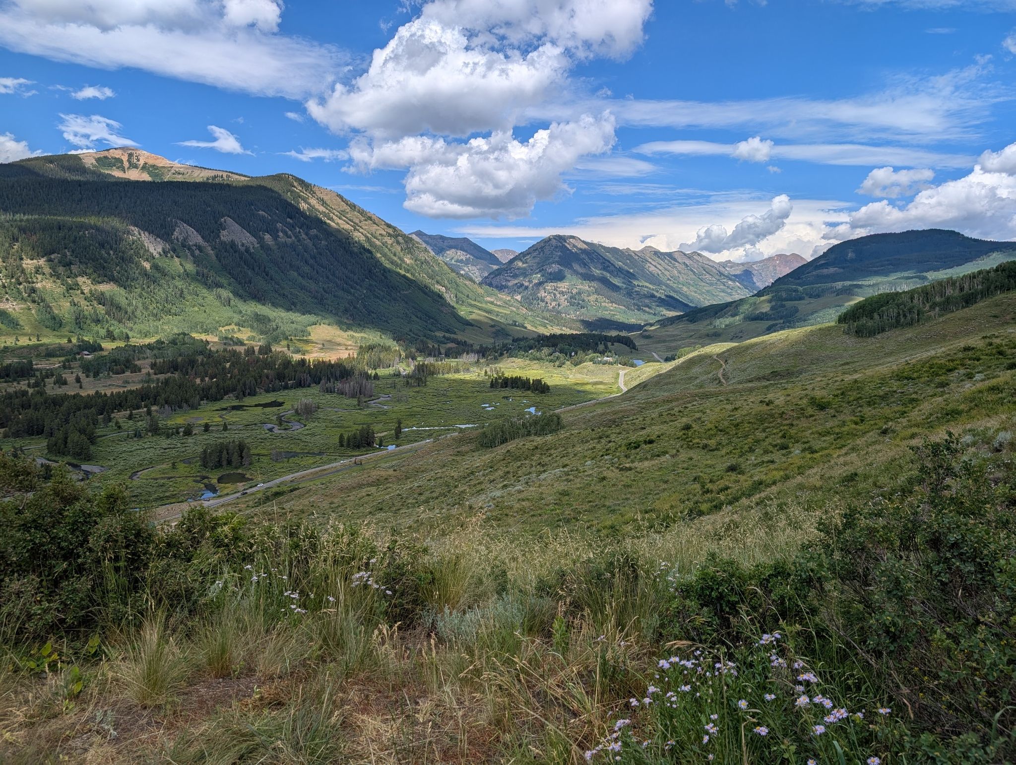 Expansive green mountain valley under a bright, partly cloudy sky. - Lupine 2, Smith Hill Road, and Lupine 1