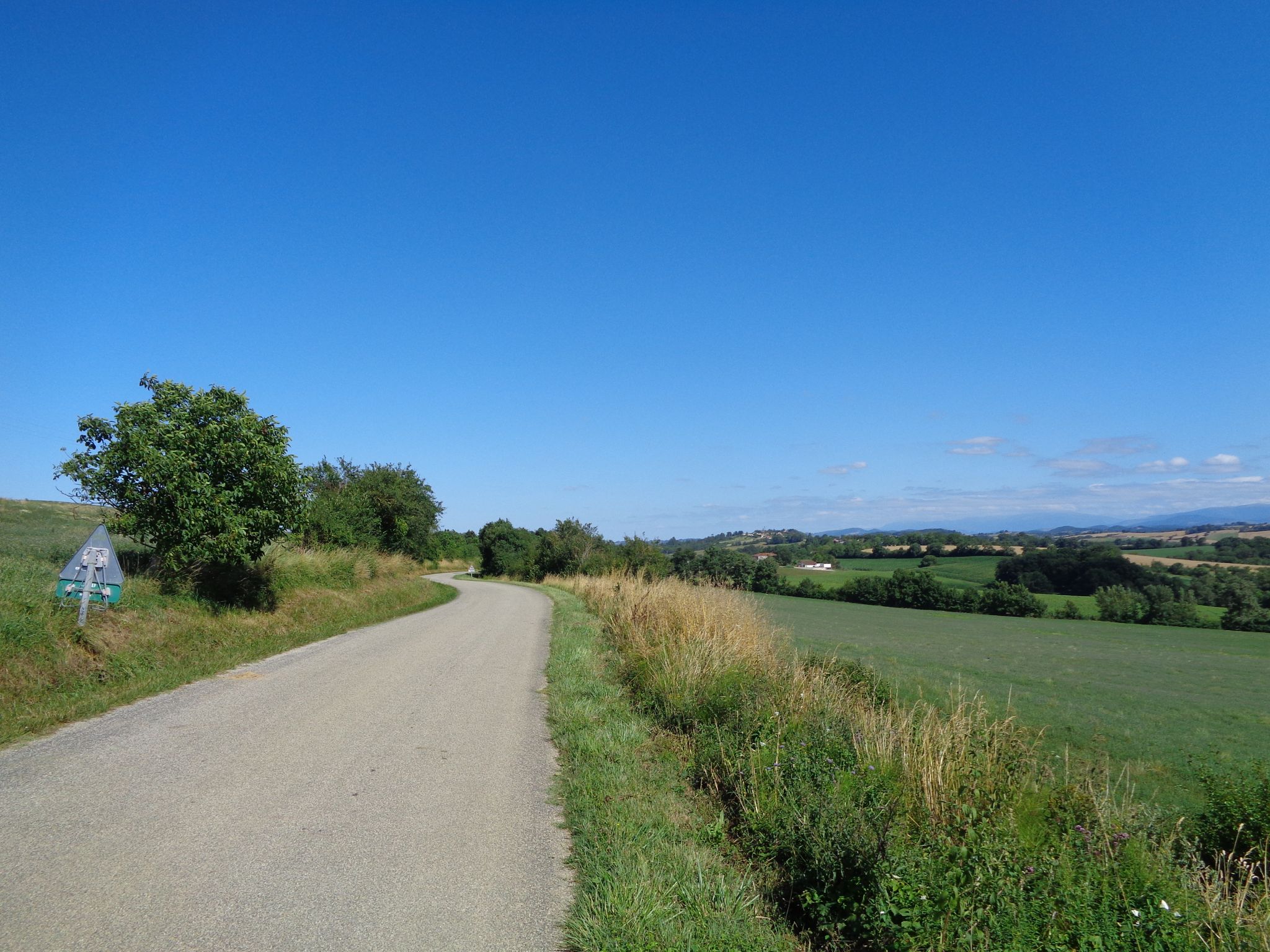 Following a really nice ridge route, the D26 at this stage, towards Carla Bayle on the horizon.