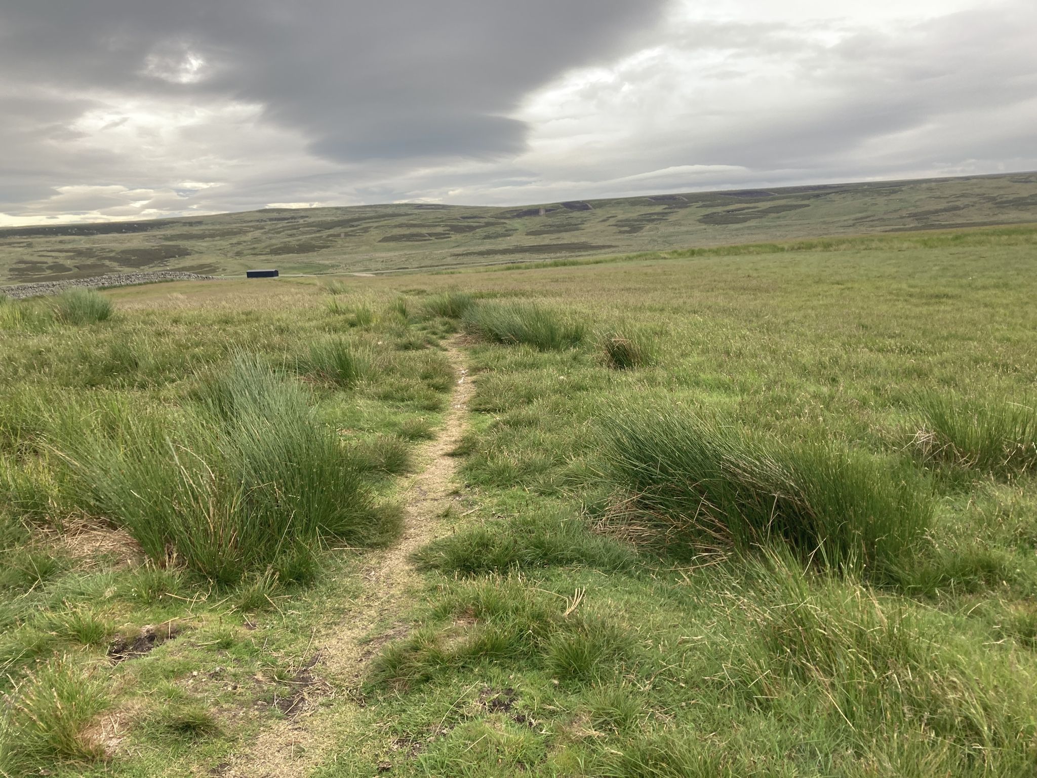 Looking back at the shelter and moorland I crossed behind it