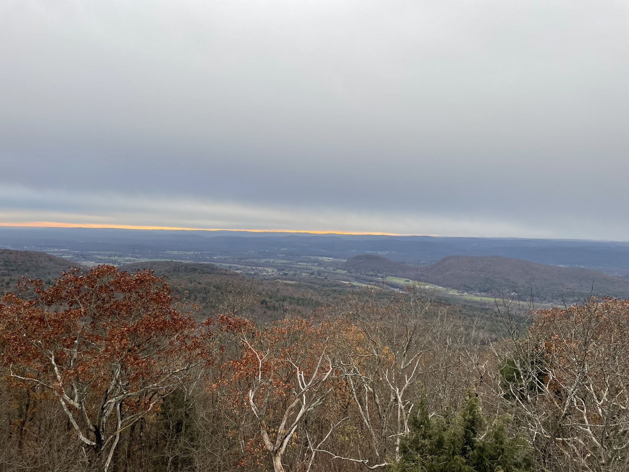 Vast forested landscape under an overcast sky with a distant horizon. - Mount Toby loop from Mount Sugarloaf State Reservation
