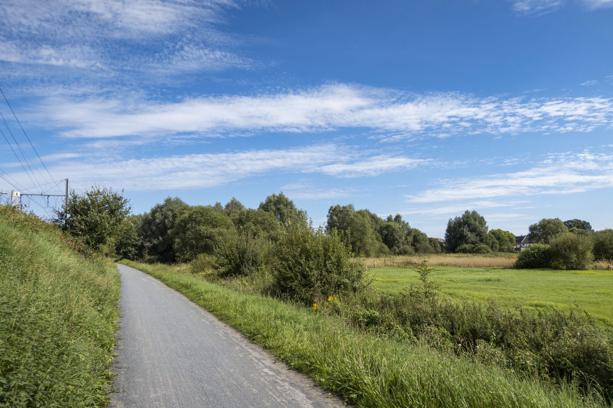Over de gravel langs het spoor naar Denderleeuw